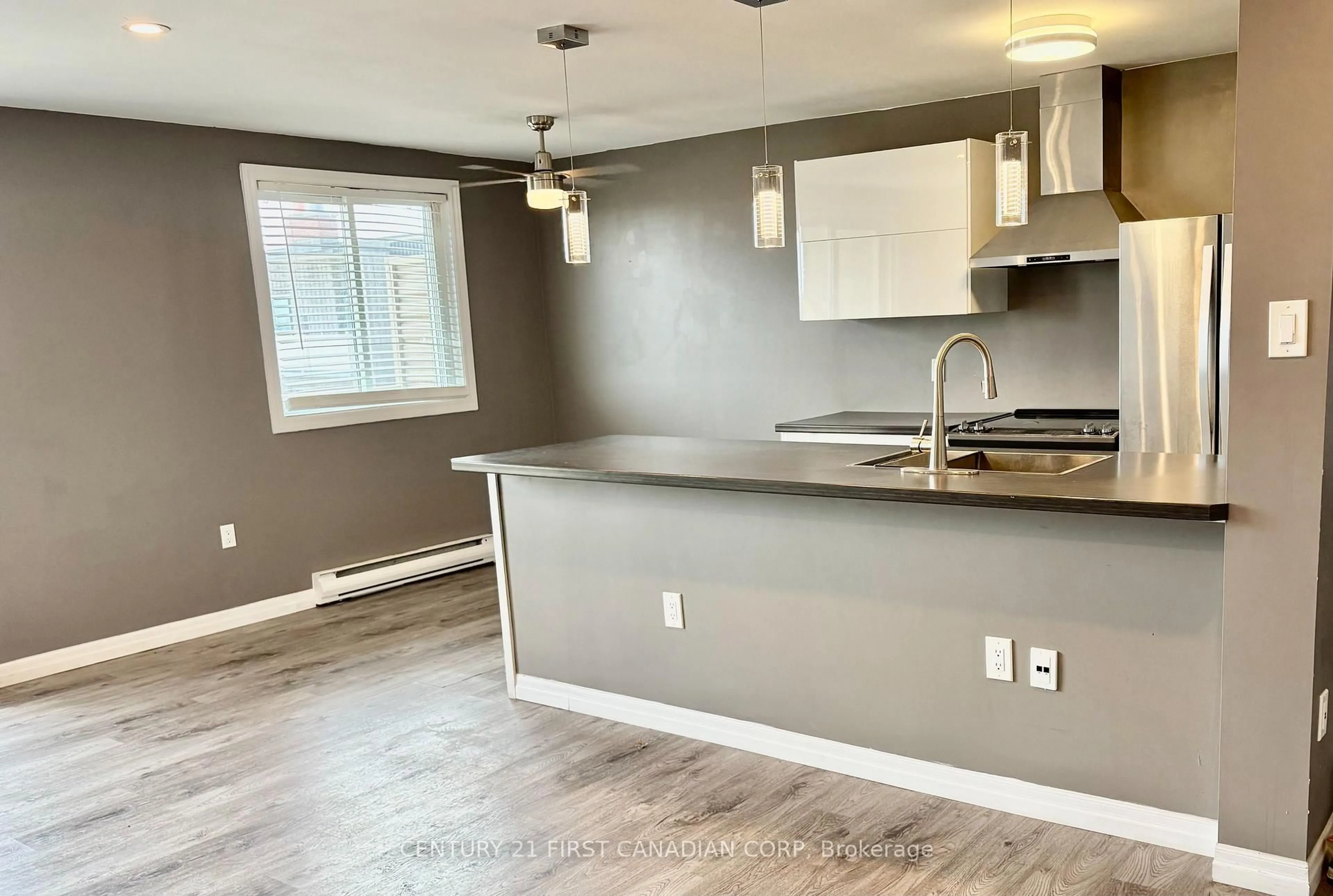 Open concept kitchen, wood/laminate floor for 1102 Jalna Blvd #601, London South Ontario N6E 1X8
