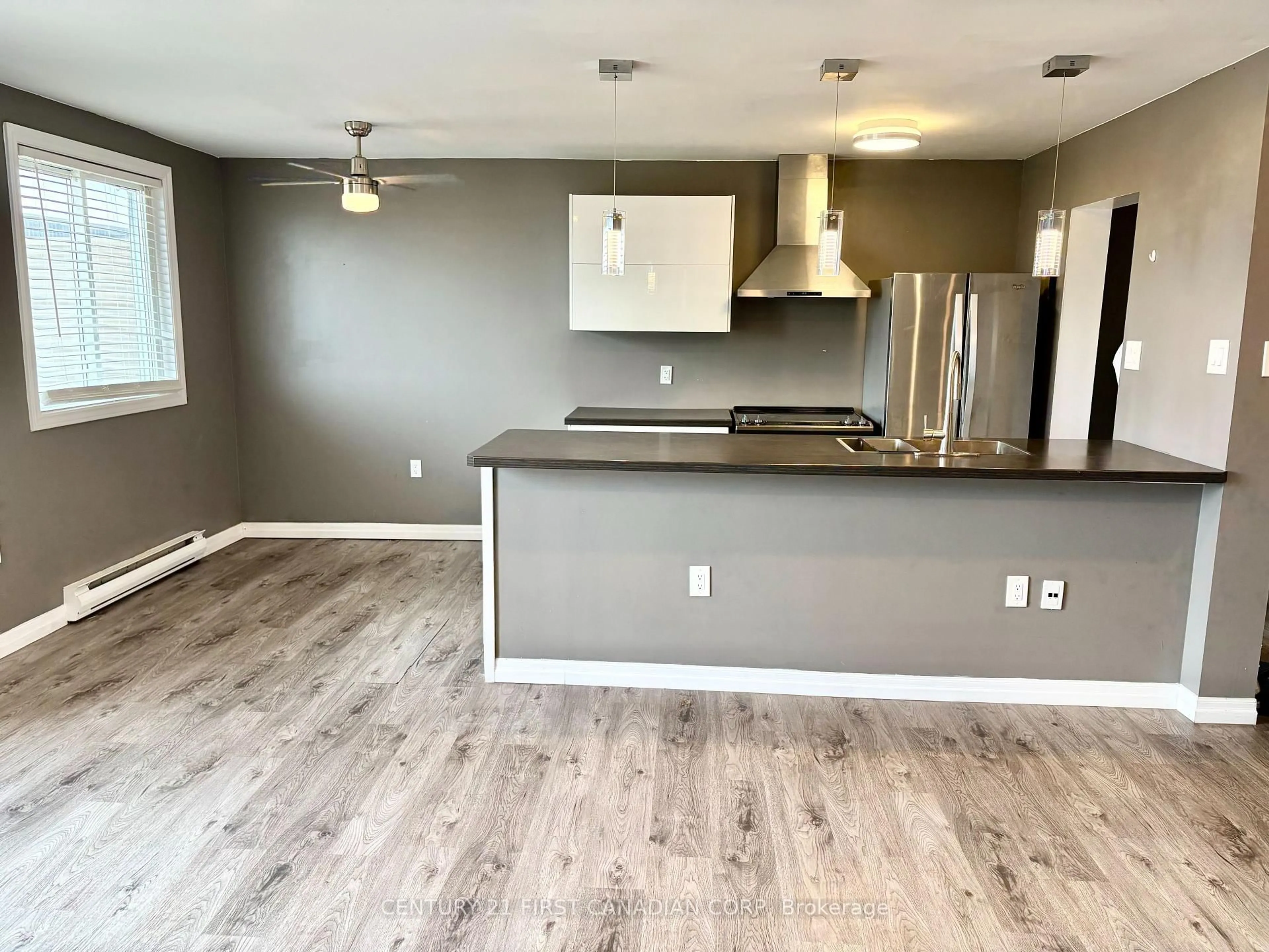 Open concept kitchen, wood/laminate floor for 1102 Jalna Blvd #601, London South Ontario N6E 1X8