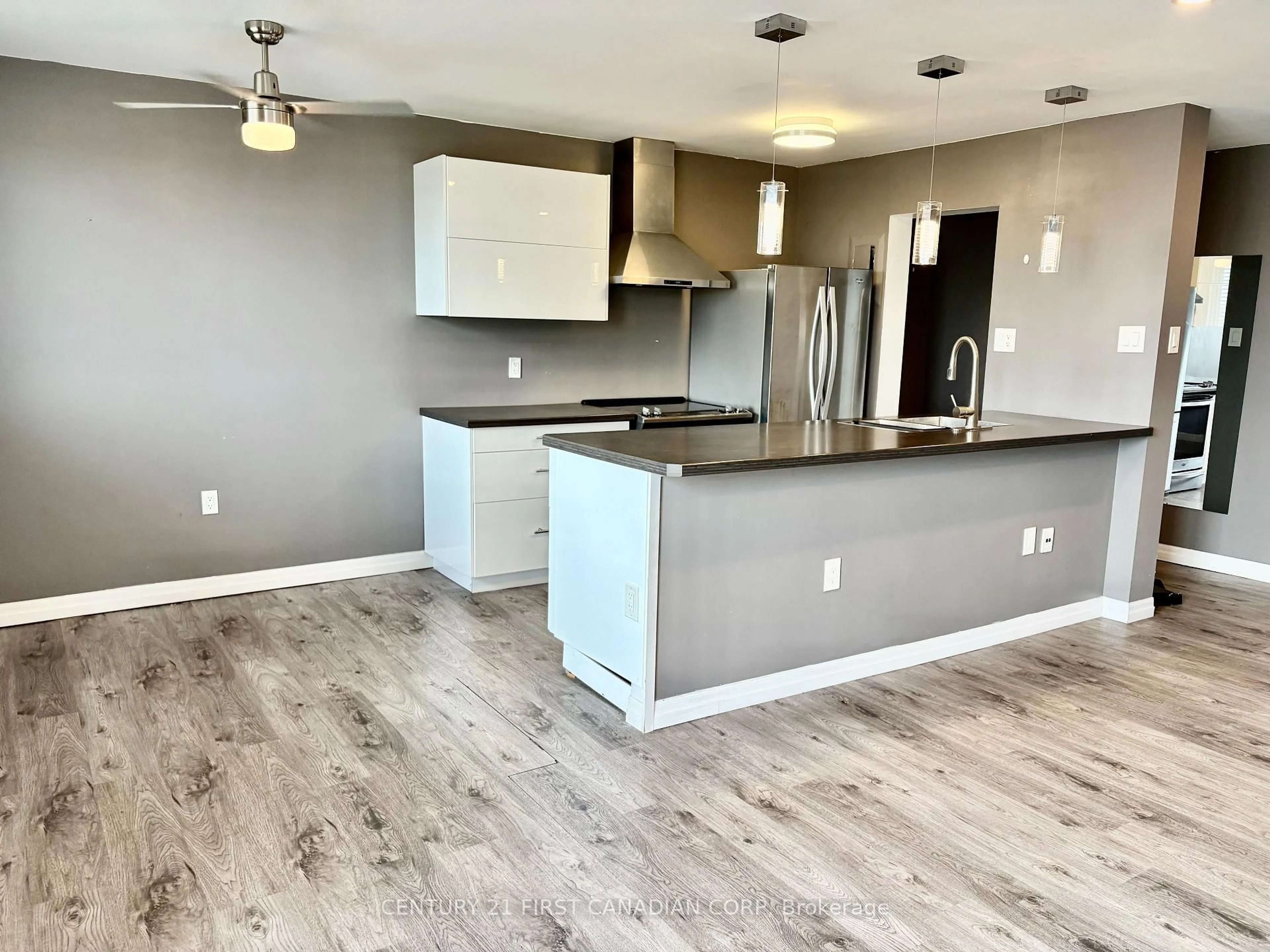 Open concept kitchen, wood/laminate floor for 1102 Jalna Blvd #601, London South Ontario N6E 1X8