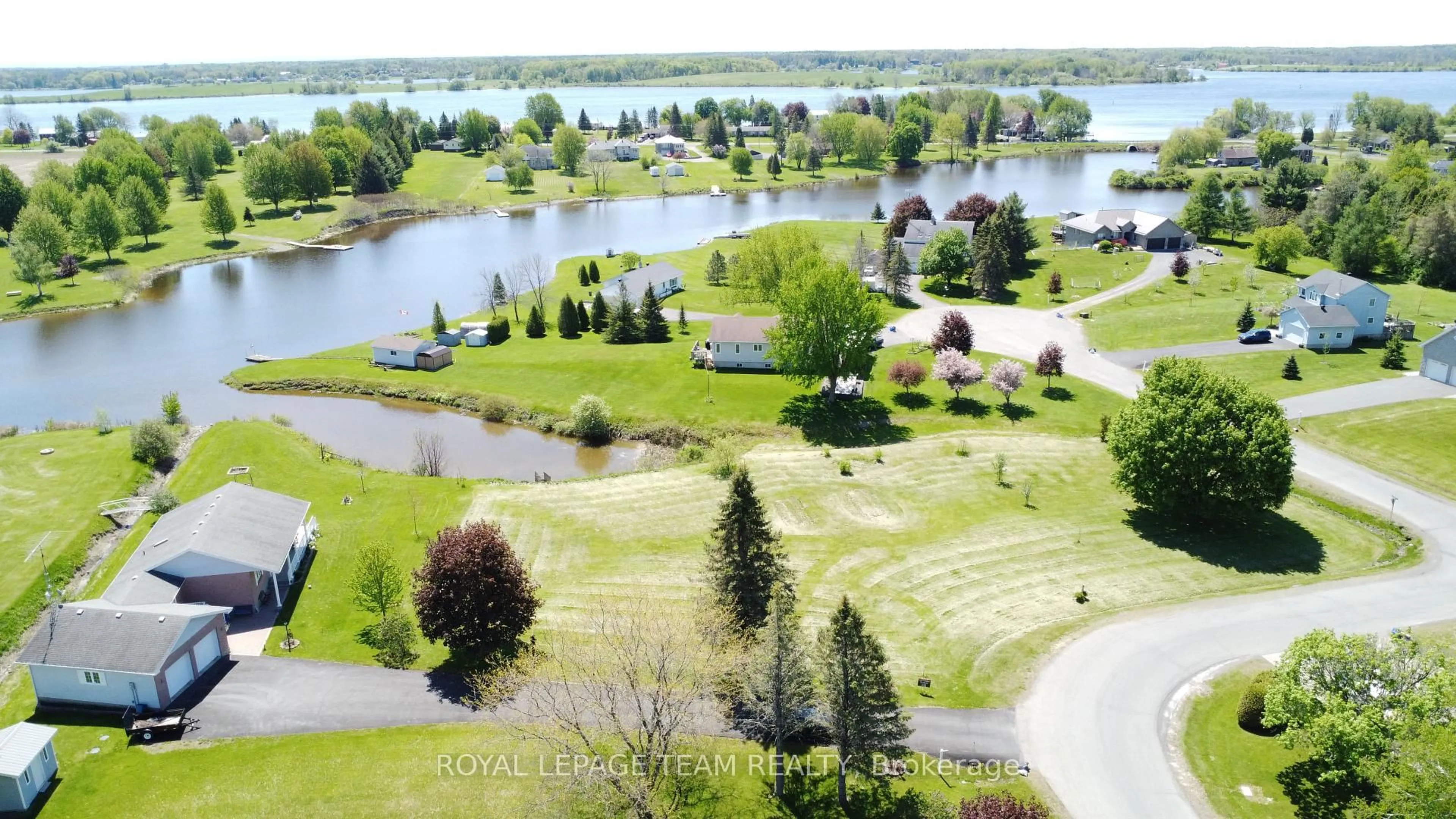 A pic from outside/outdoor area/front of a property/back of a property/a pic from drone, water/lake/river/ocean view for 11708 Breezewood Ave, South Dundas Ontario K0C 1X0