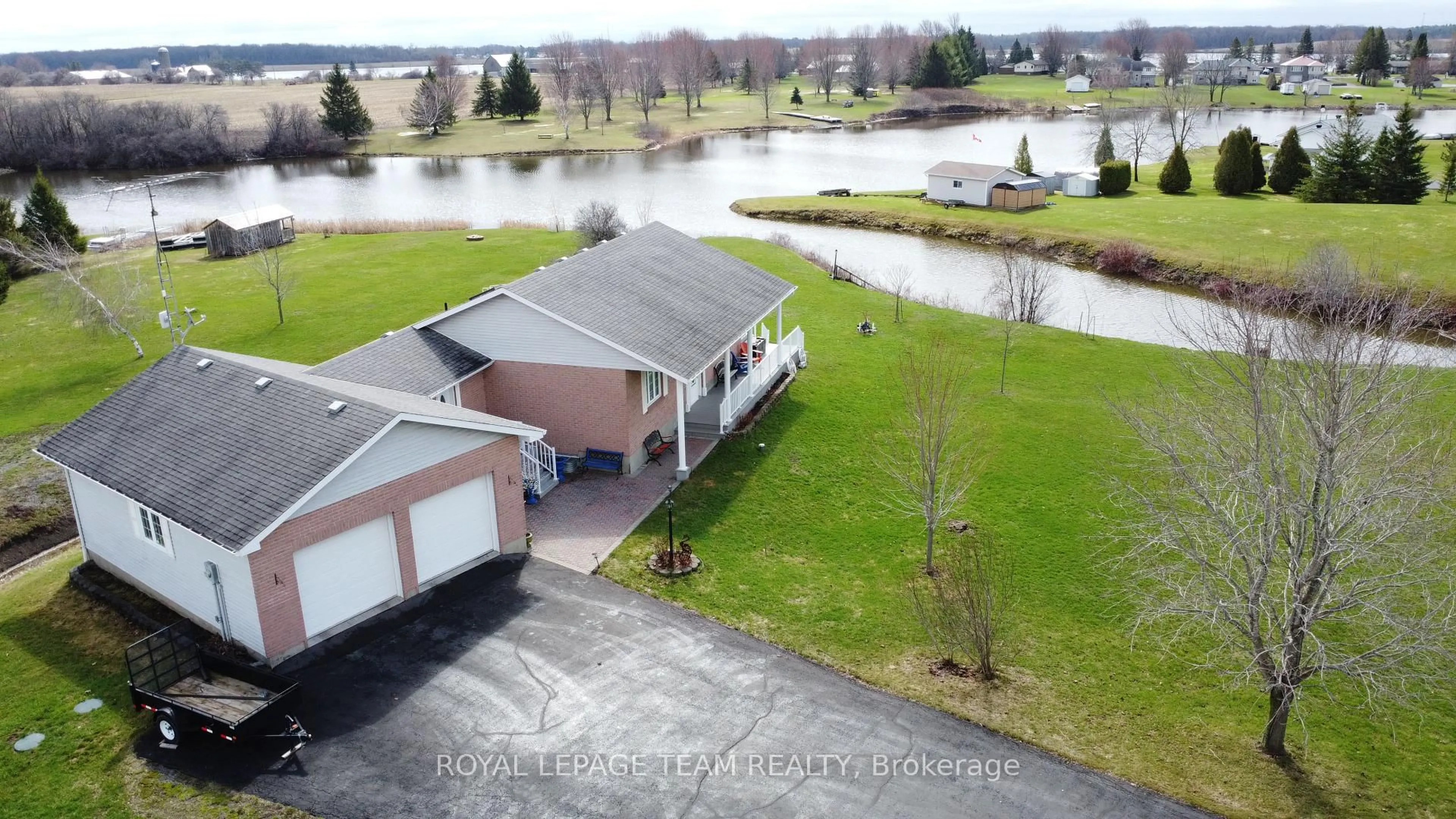 A pic from outside/outdoor area/front of a property/back of a property/a pic from drone, water/lake/river/ocean view for 11708 Breezewood Ave, South Dundas Ontario K0C 1X0