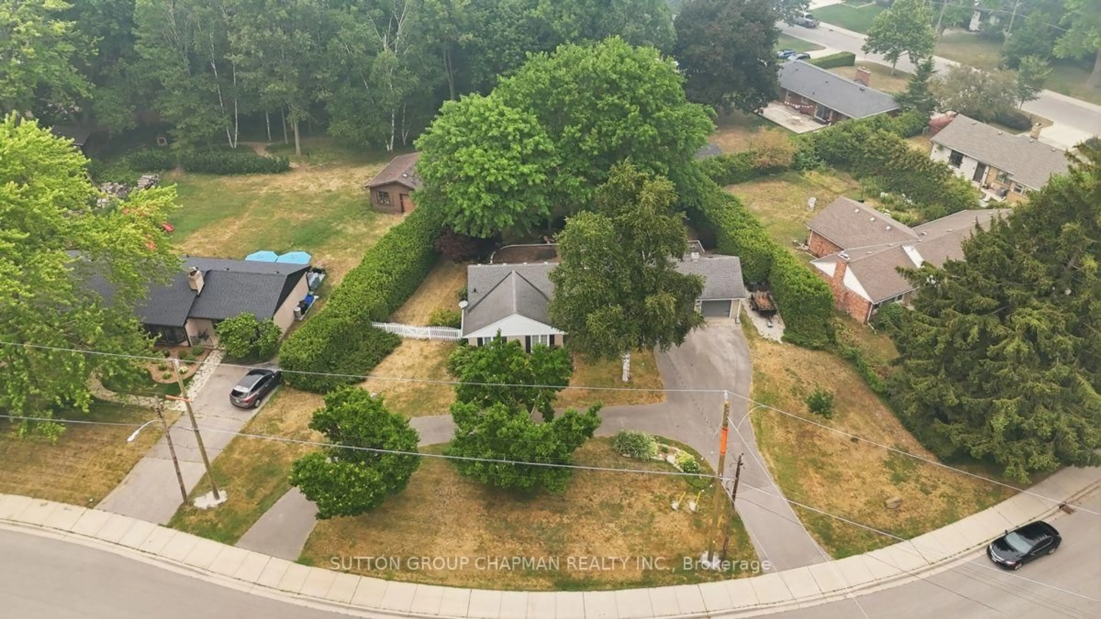 A pic from outside/outdoor area/front of a property/back of a property/a pic from drone, forest/trees view for 763 Oban Cres, London North Ontario N6H 2V8