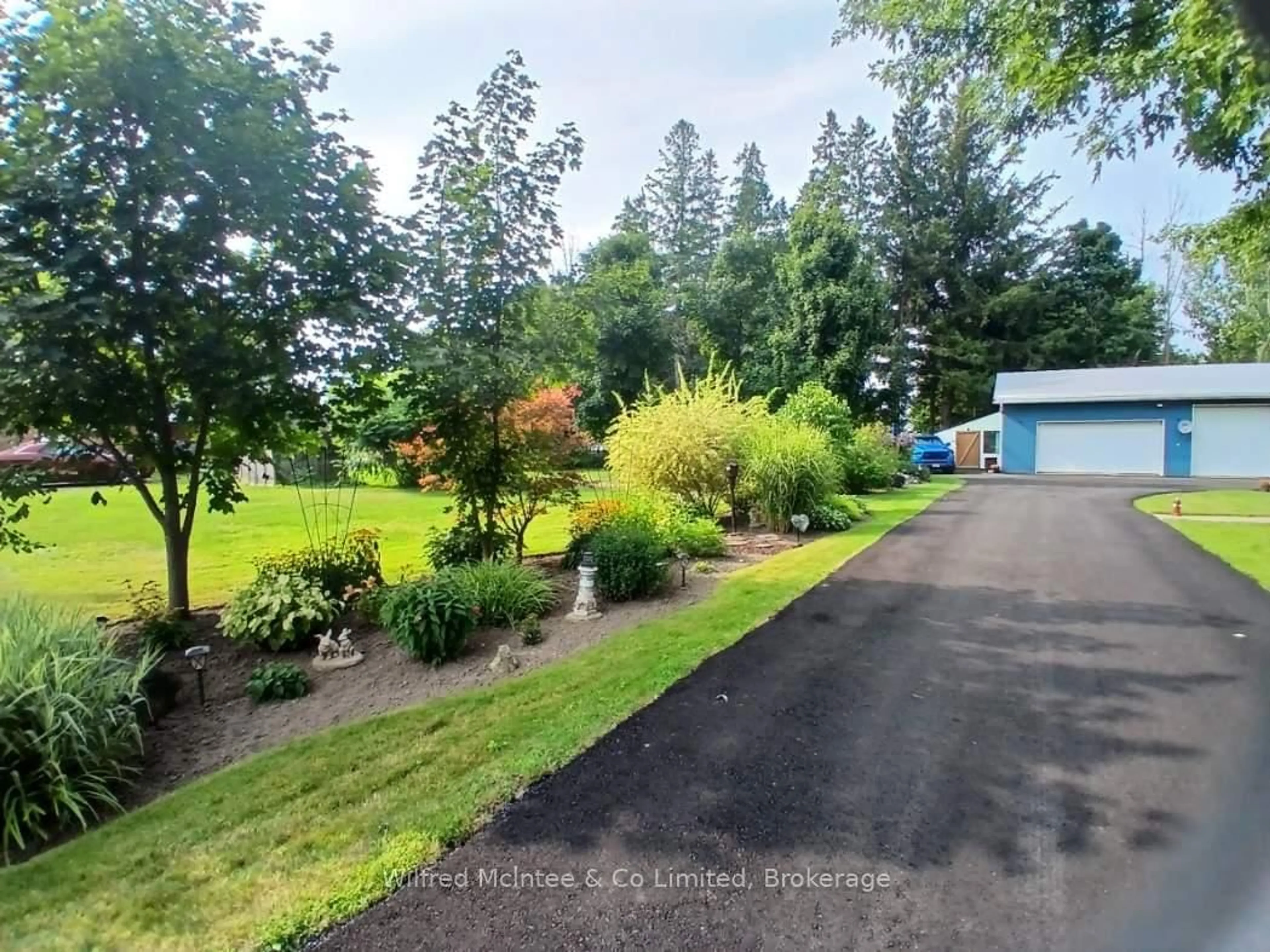 A pic from outside/outdoor area/front of a property/back of a property/a pic from drone, water/lake/river/ocean view for 21571 Grey Road 16, Georgian Bluffs Ontario N0H 2N0