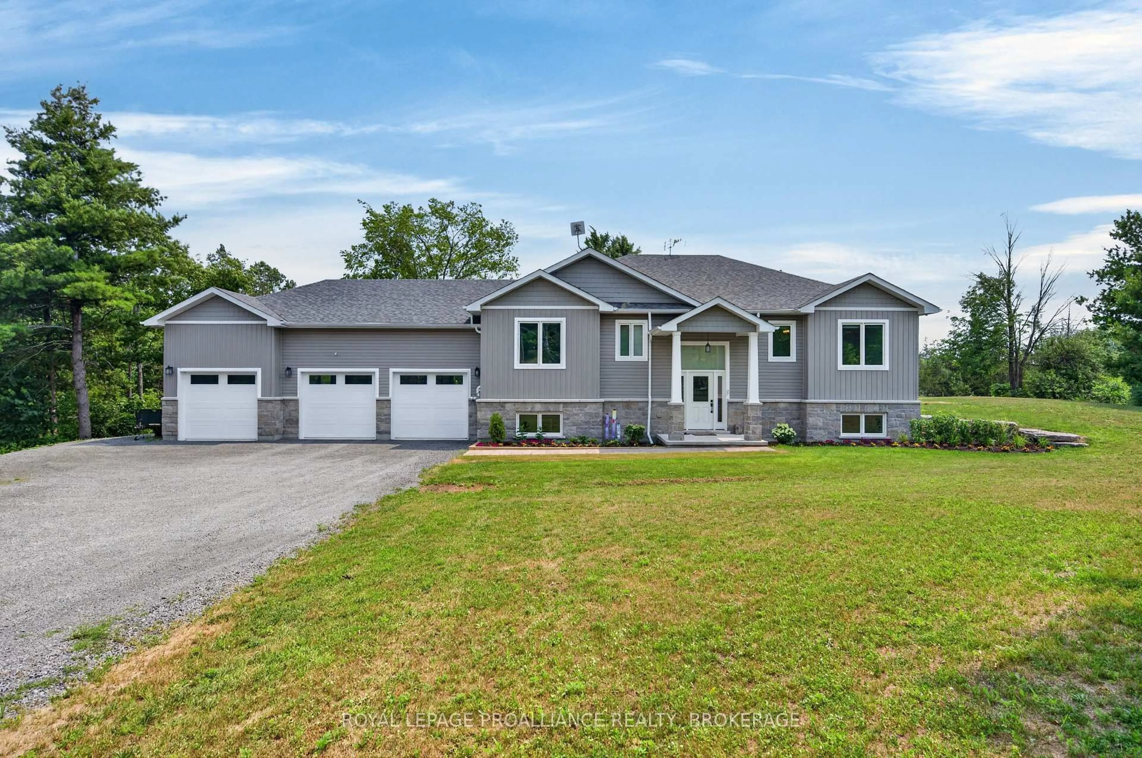 Home with vinyl exterior material, street for 12 Petworth Rd, Yarker Ontario K0K 3N0