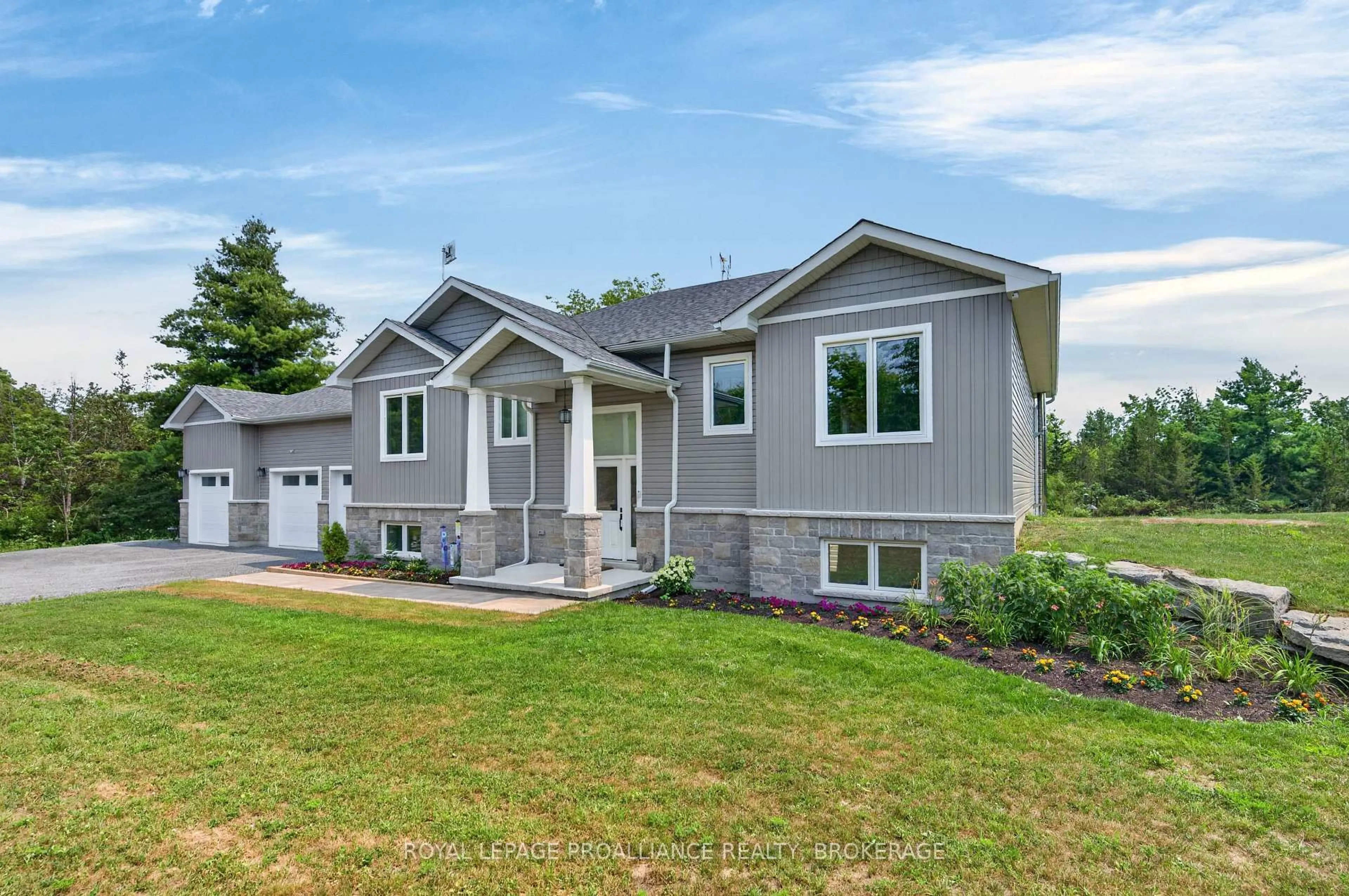 Home with vinyl exterior material, street for 12 Petworth Rd, Yarker Ontario K0K 3N0