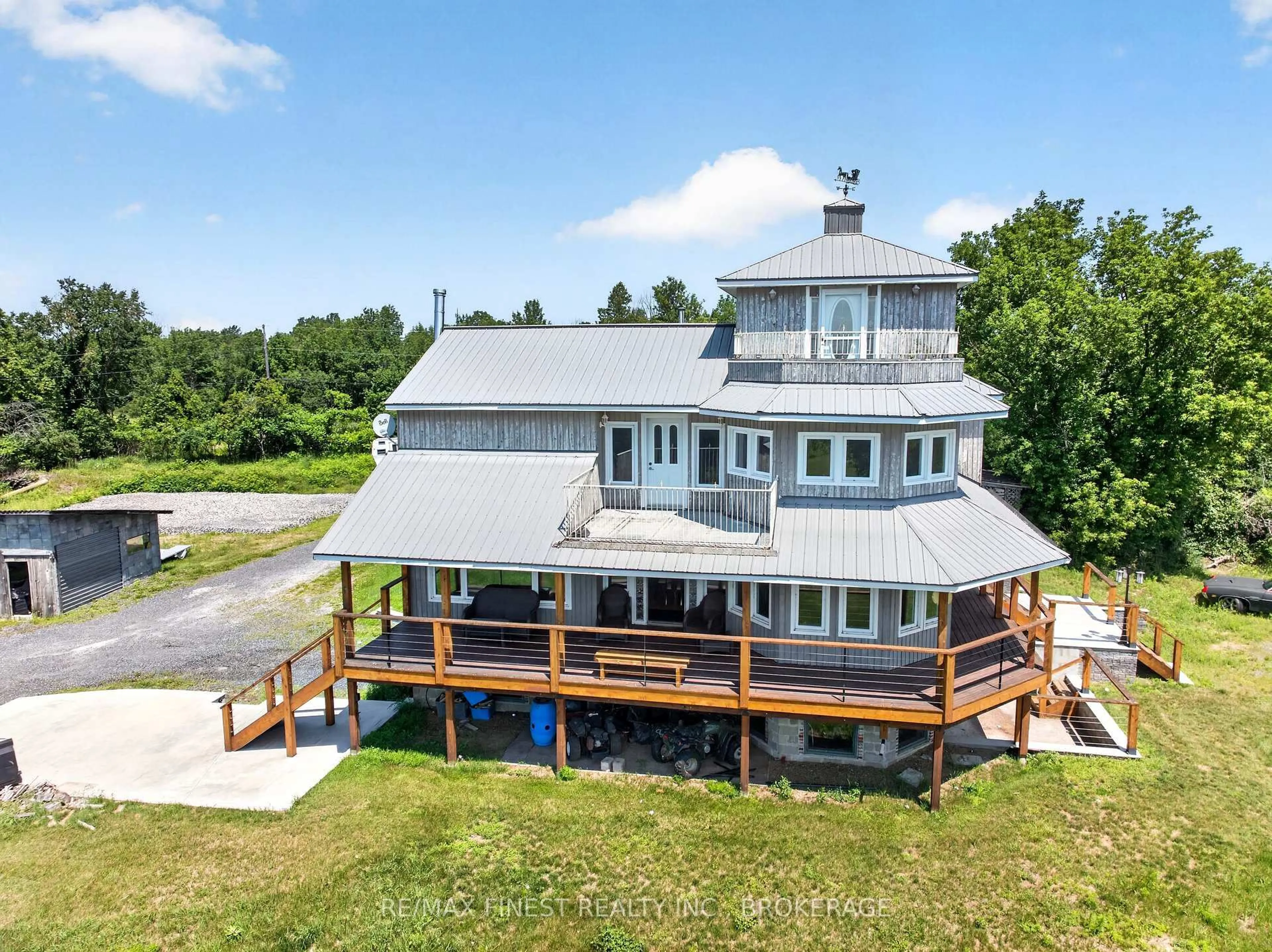 A pic from outside/outdoor area/front of a property/back of a property/a pic from drone, water/lake/river/ocean view for 141 Silver Lake Lane 22, Maberly Ontario K0H 2B0
