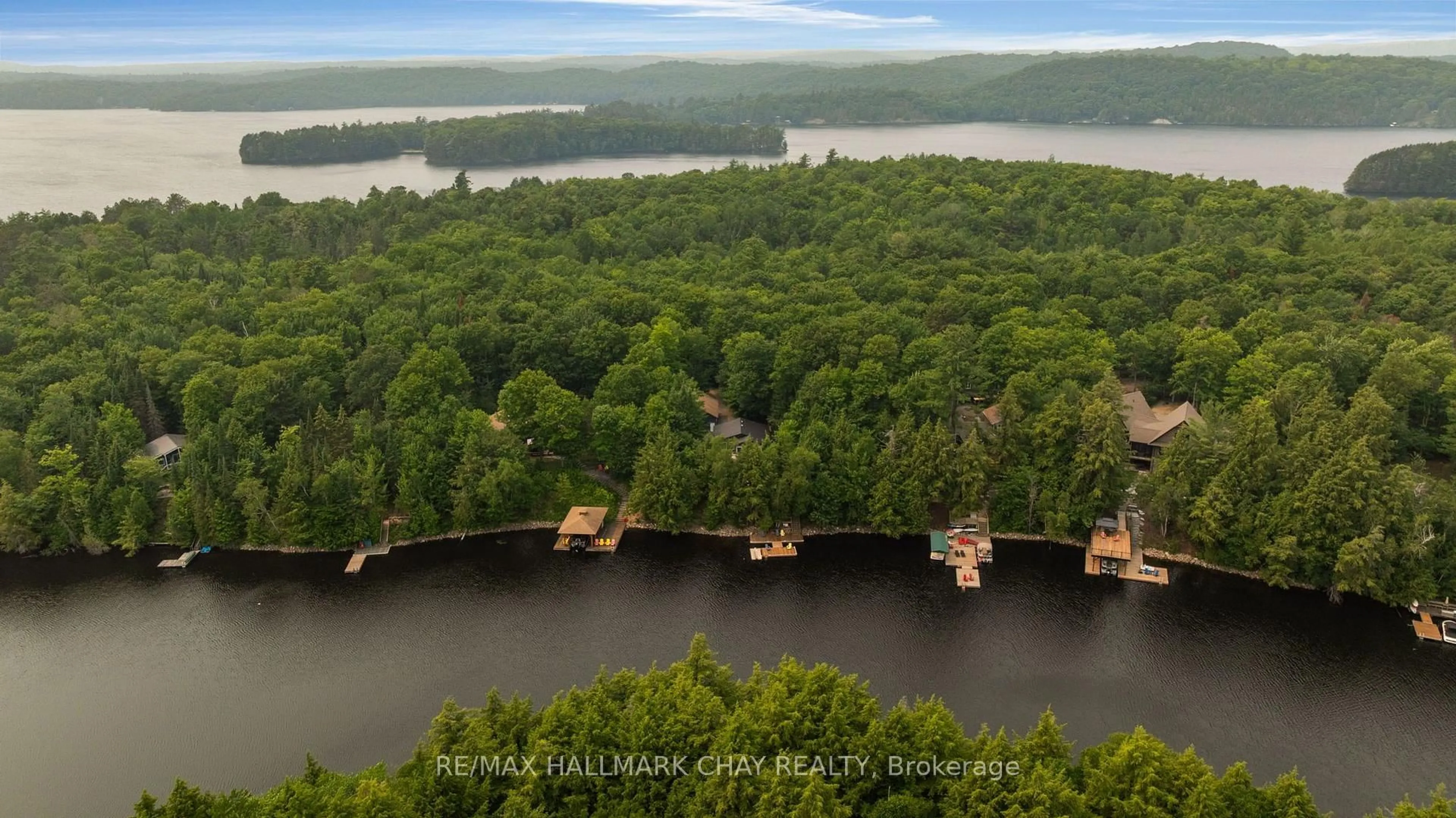 A pic from outside/outdoor area/front of a property/back of a property/a pic from drone, water/lake/river/ocean view for 1315 Wolf Circ, Algonquin Highlands Ontario P0A 1E0