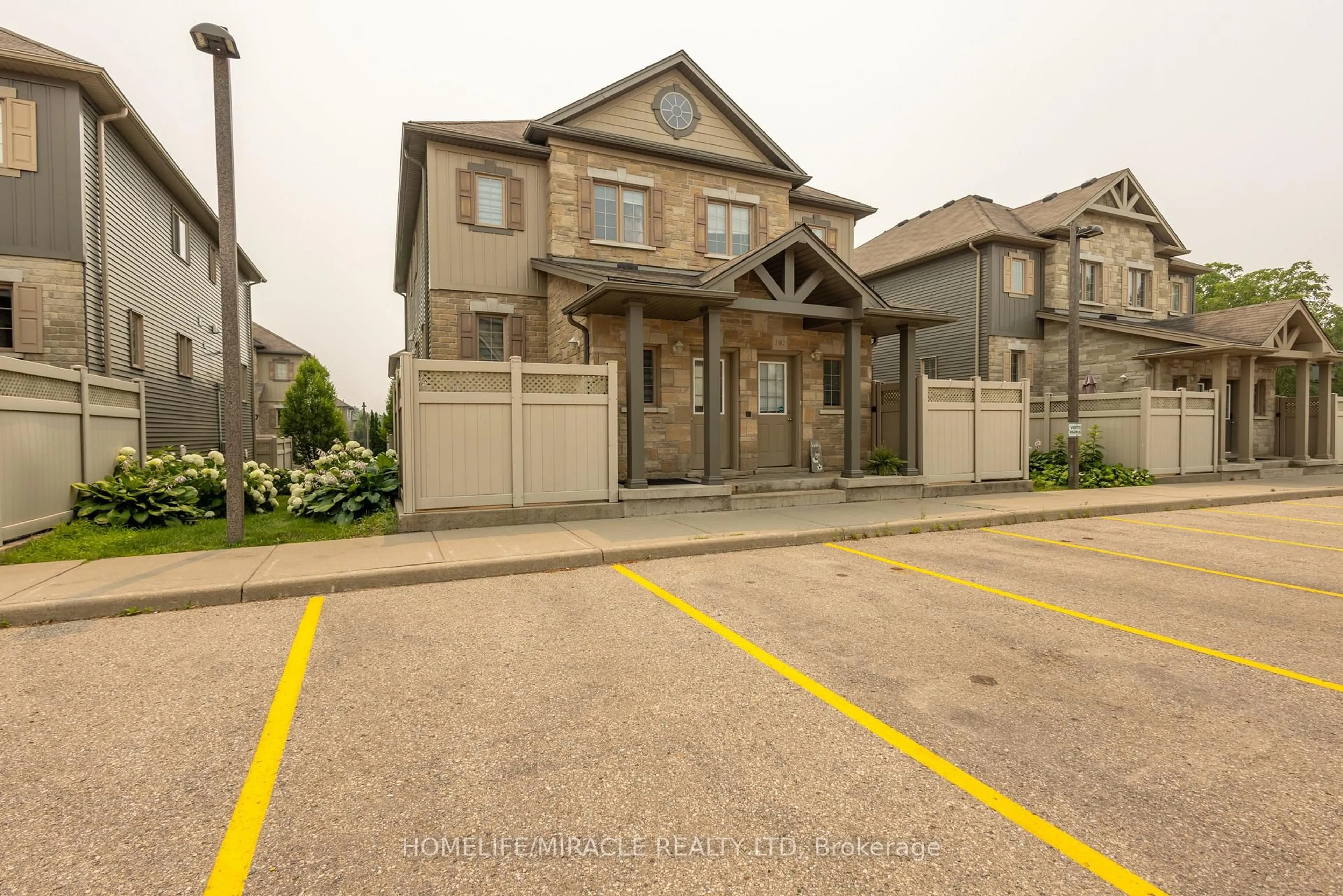 A pic from outside/outdoor area/front of a property/back of a property/a pic from drone, street for 931 Glasgow St #30B, Kitchener Ontario N2N 0B6