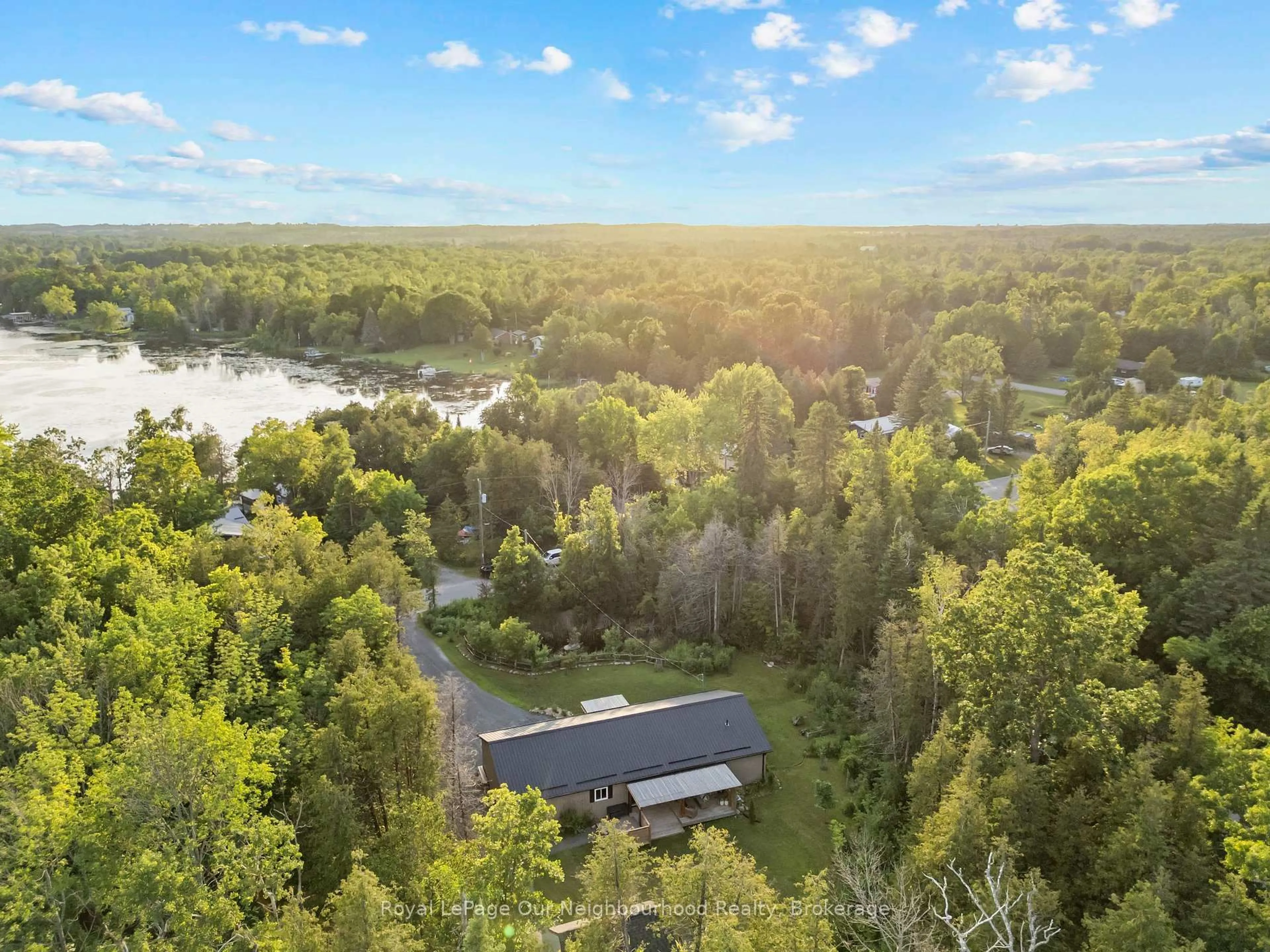 A pic from outside/outdoor area/front of a property/back of a property/a pic from drone, forest/trees view for 27 Cedar Shores Dr, Trent Hills Ontario K0L 1Z0
