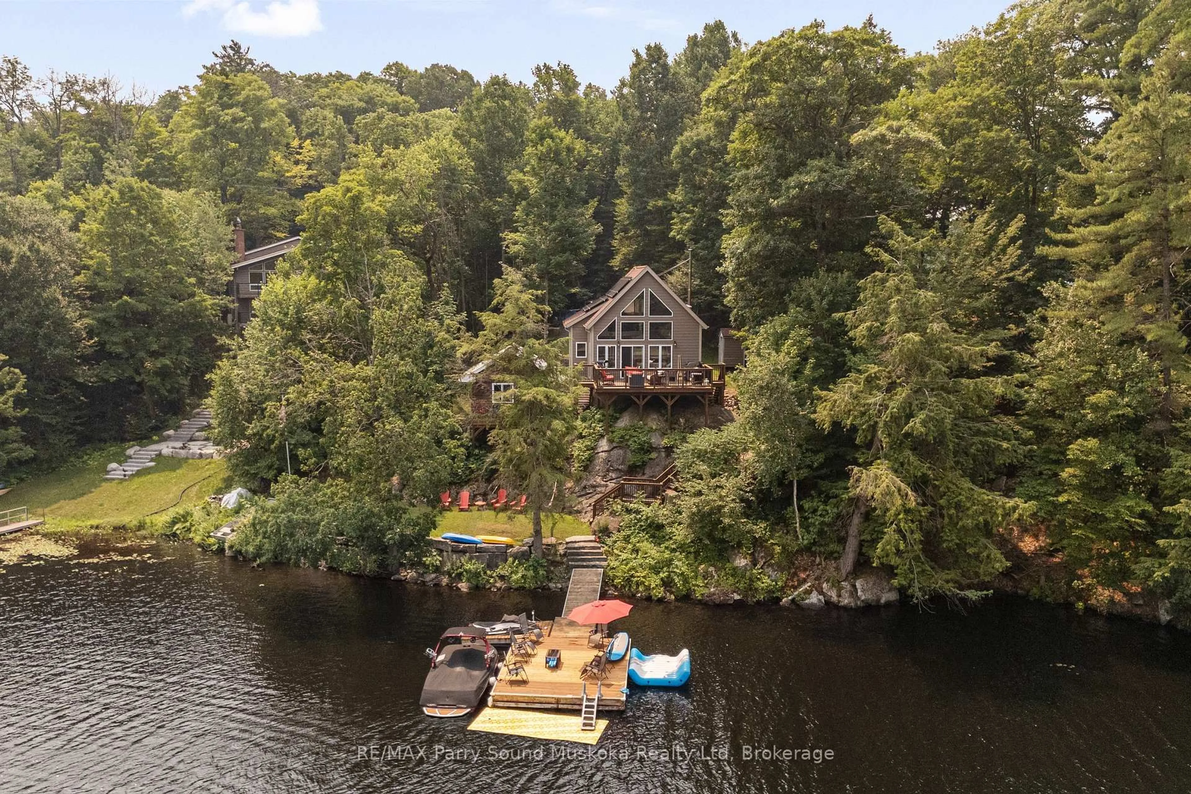 A pic from outside/outdoor area/front of a property/back of a property/a pic from drone, water/lake/river/ocean view for 5 Eagle Ridge Lane, McDougall Ontario P2A 2W9