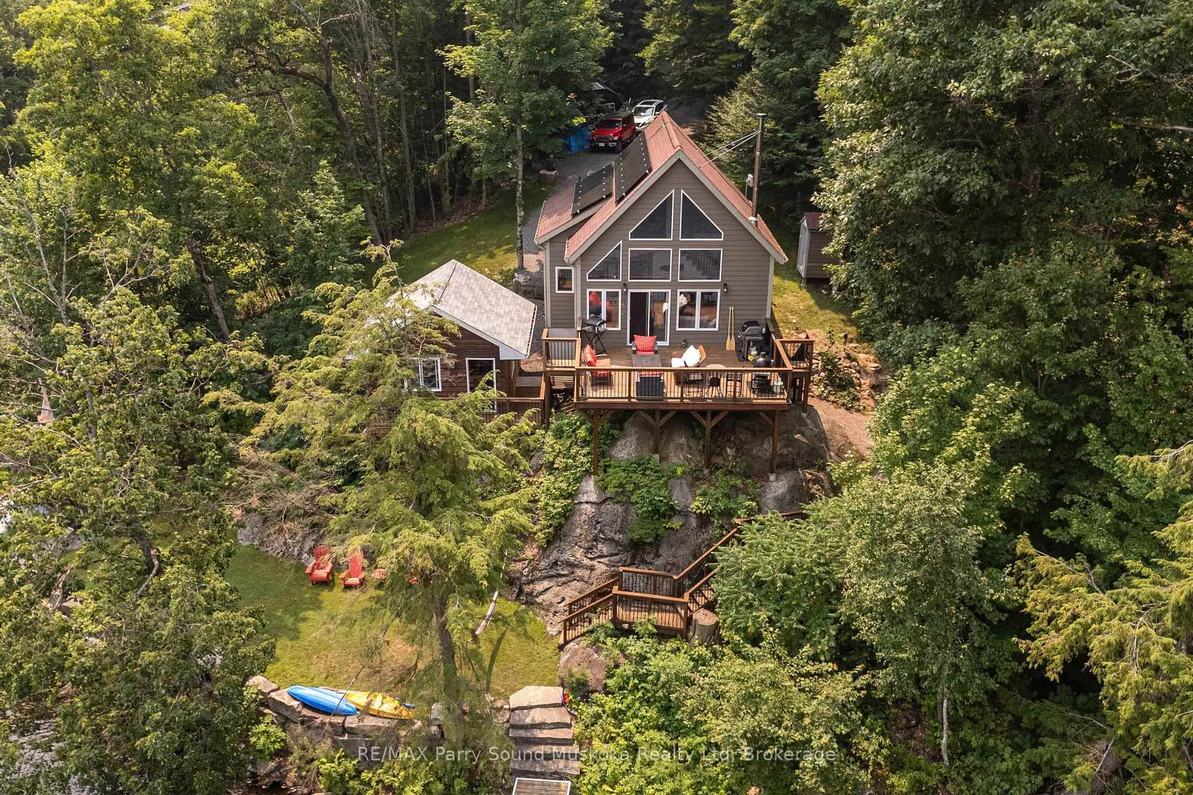 A pic from outside/outdoor area/front of a property/back of a property/a pic from drone, water/lake/river/ocean view for 5 Eagle Ridge Lane, McDougall Ontario P2A 2W9