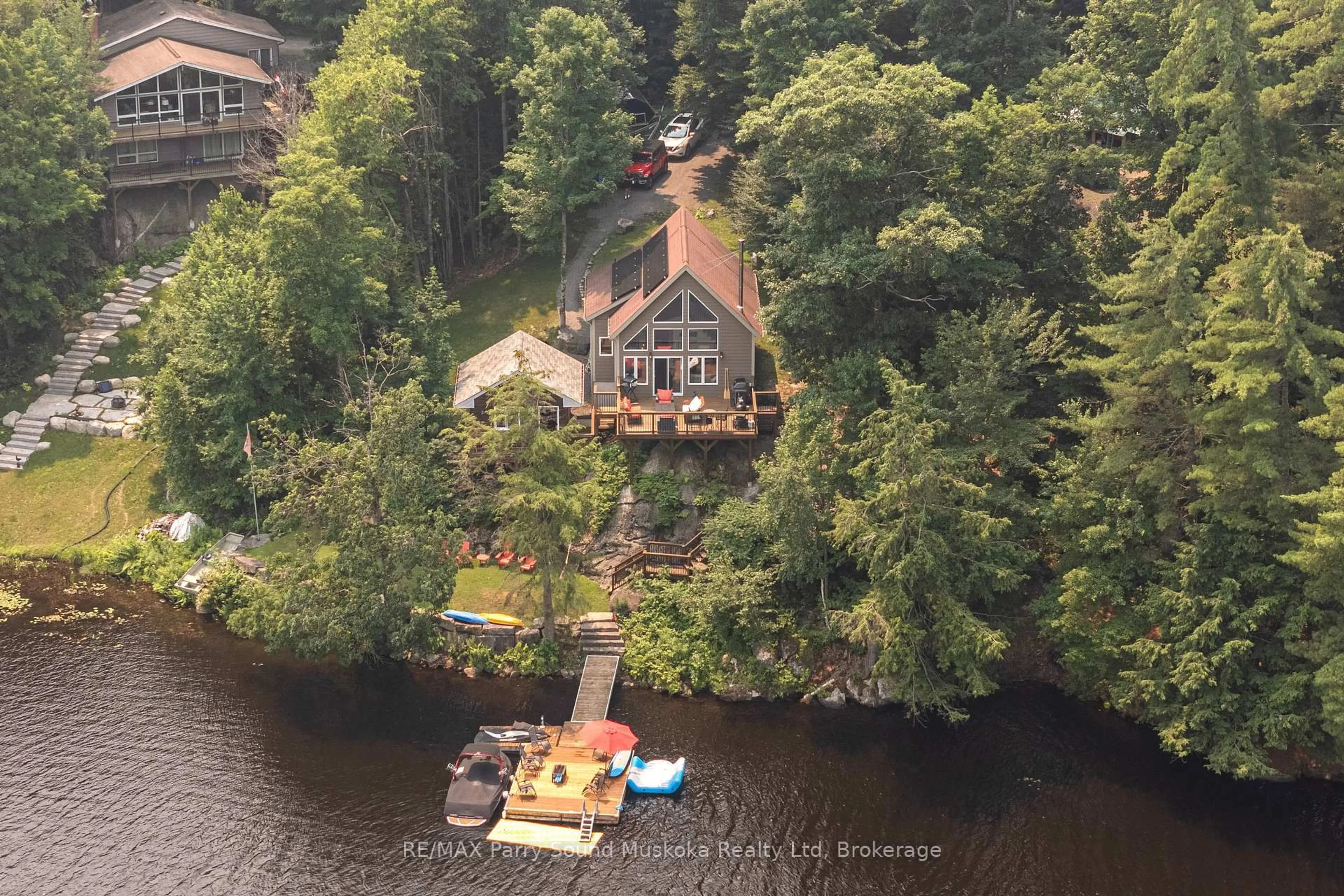 A pic from outside/outdoor area/front of a property/back of a property/a pic from drone, water/lake/river/ocean view for 5 Eagle Ridge Lane, McDougall Ontario P2A 2W9