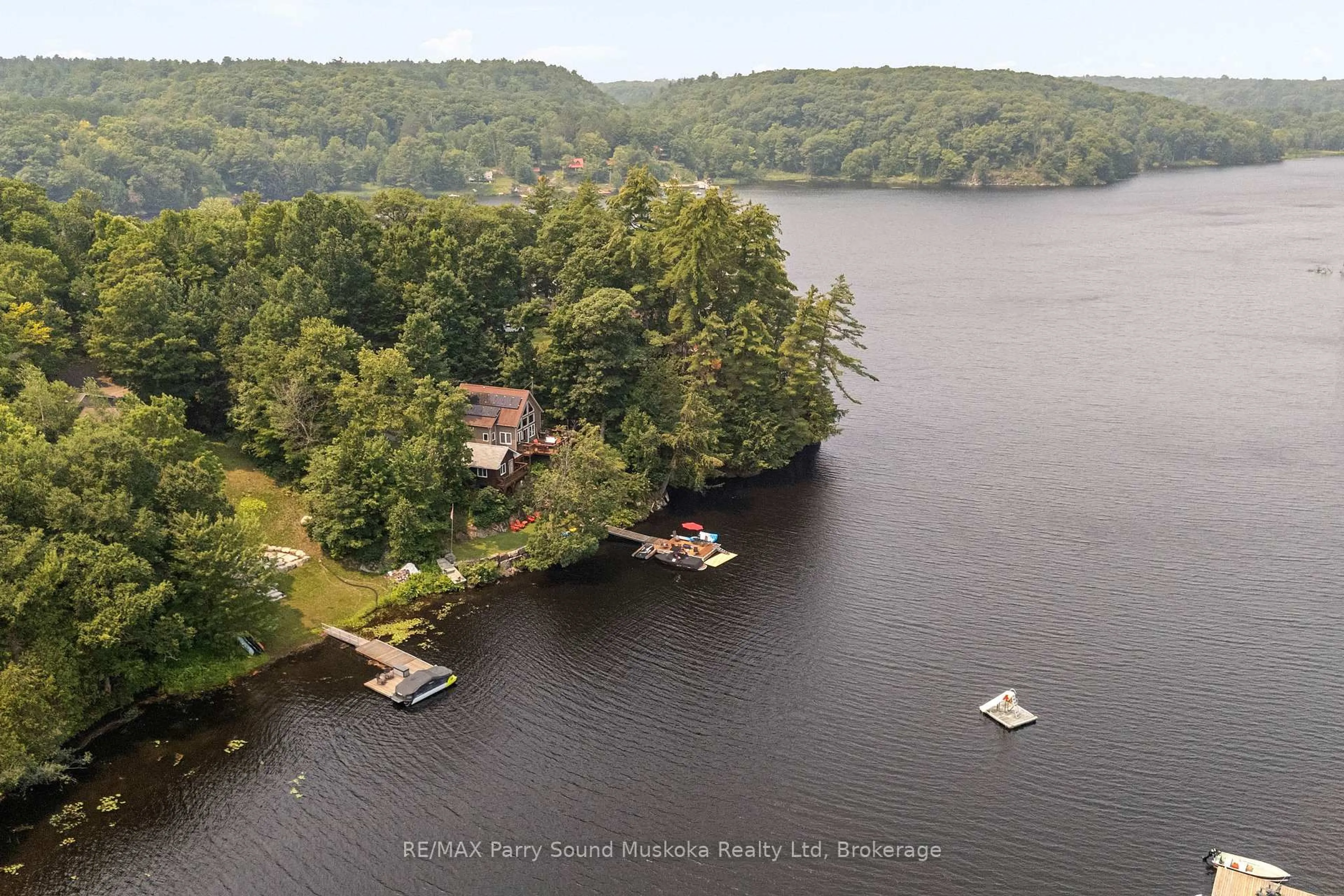 A pic from outside/outdoor area/front of a property/back of a property/a pic from drone, water/lake/river/ocean view for 5 Eagle Ridge Lane, McDougall Ontario P2A 2W9