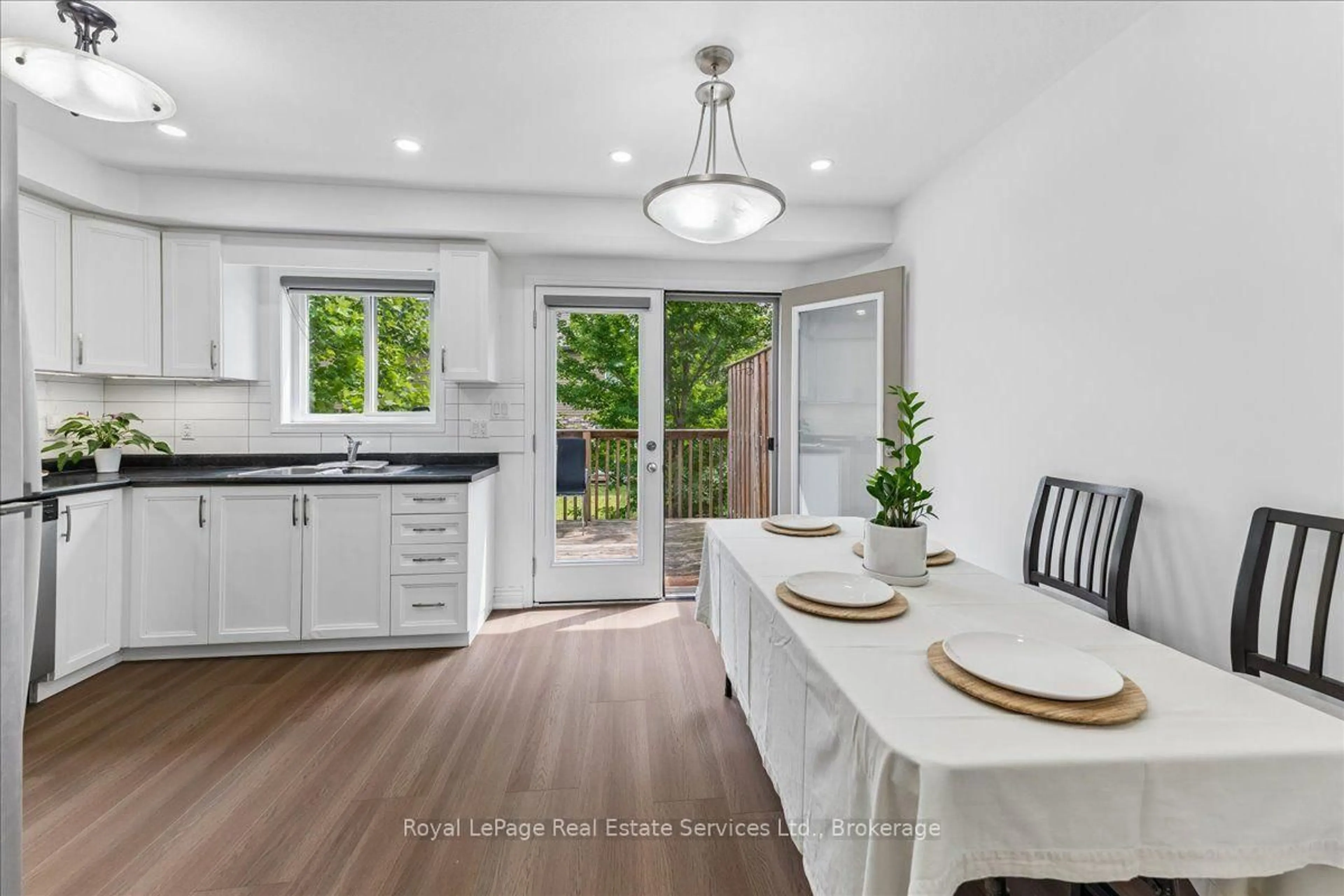 Open concept kitchen, wood/laminate floor for 388 Old Huron Rd #10B, Kitchener Ontario N2R 0J5