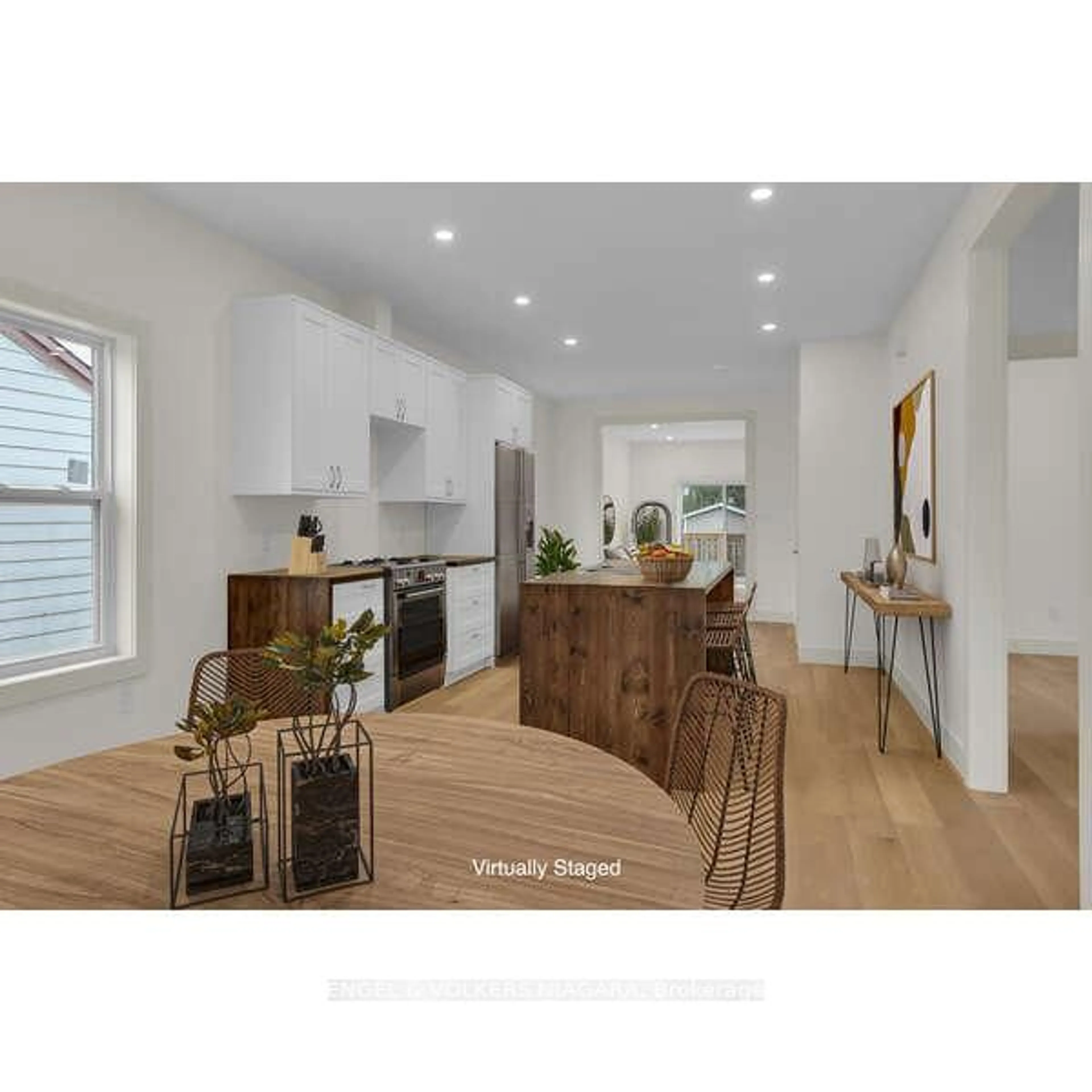 Open concept kitchen, wood/laminate floor for 154 Roosevelt Ave, Welland Ontario L3B 2G7