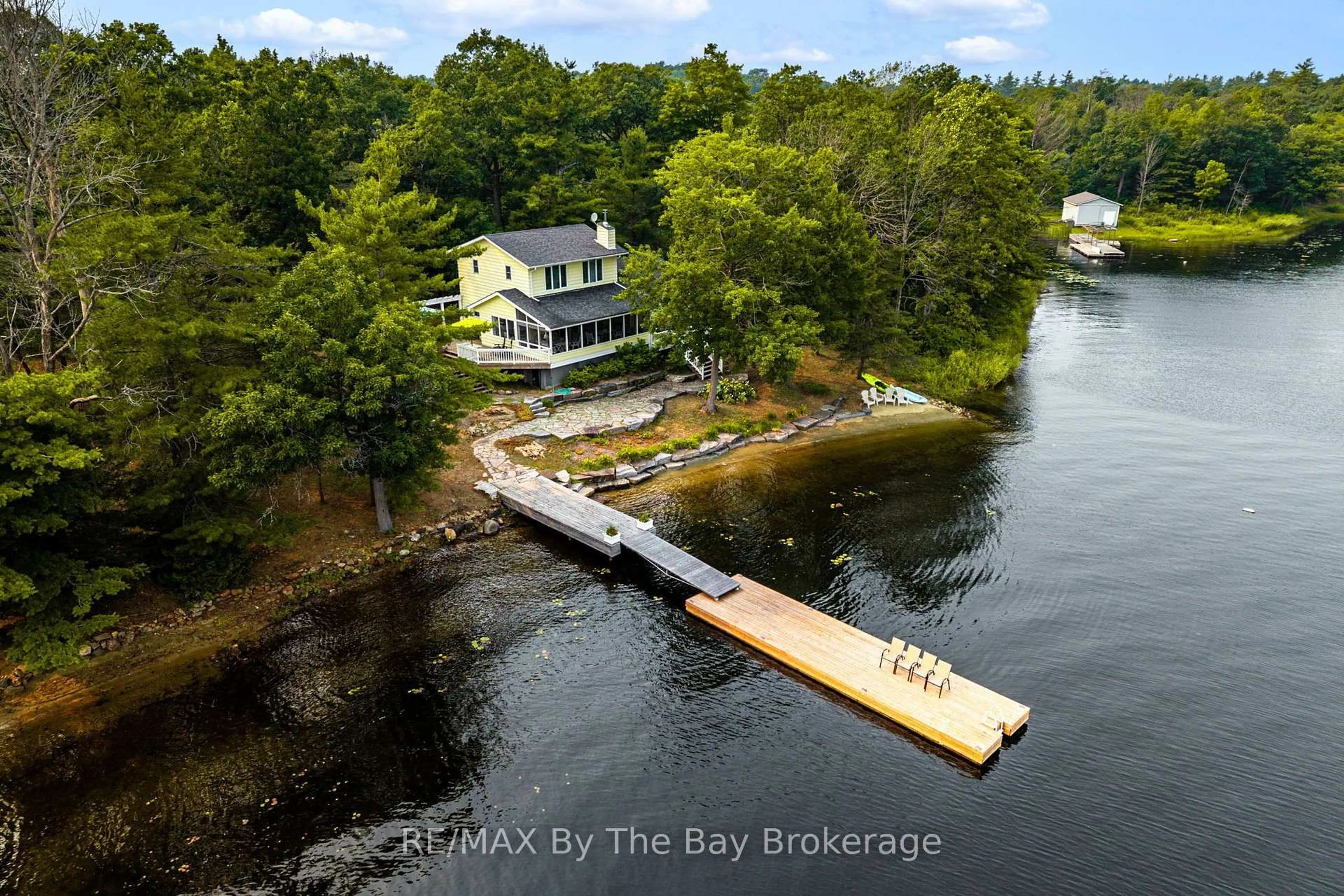 A pic from outside/outdoor area/front of a property/back of a property/a pic from drone, water/lake/river/ocean view for 13322 Georgian Bay Shore, Georgian Bay Ontario L0K 1S0
