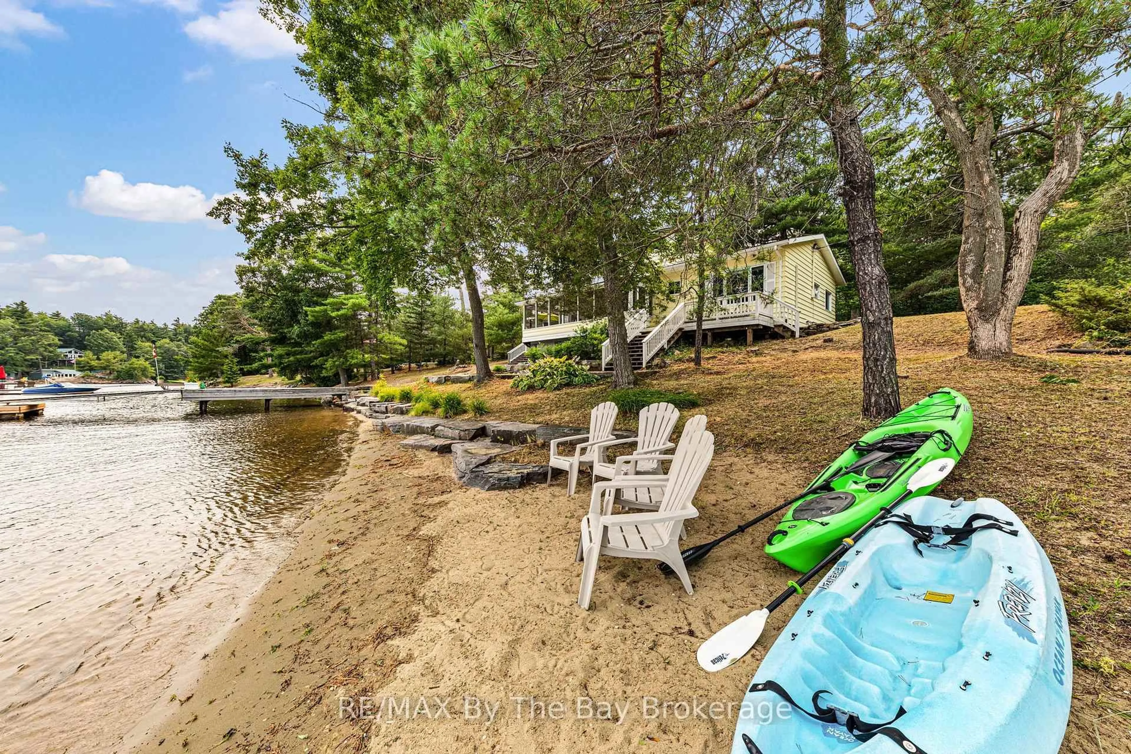 A pic from outside/outdoor area/front of a property/back of a property/a pic from drone, water/lake/river/ocean view for 13322 Georgian Bay Shore, Georgian Bay Ontario L0K 1S0