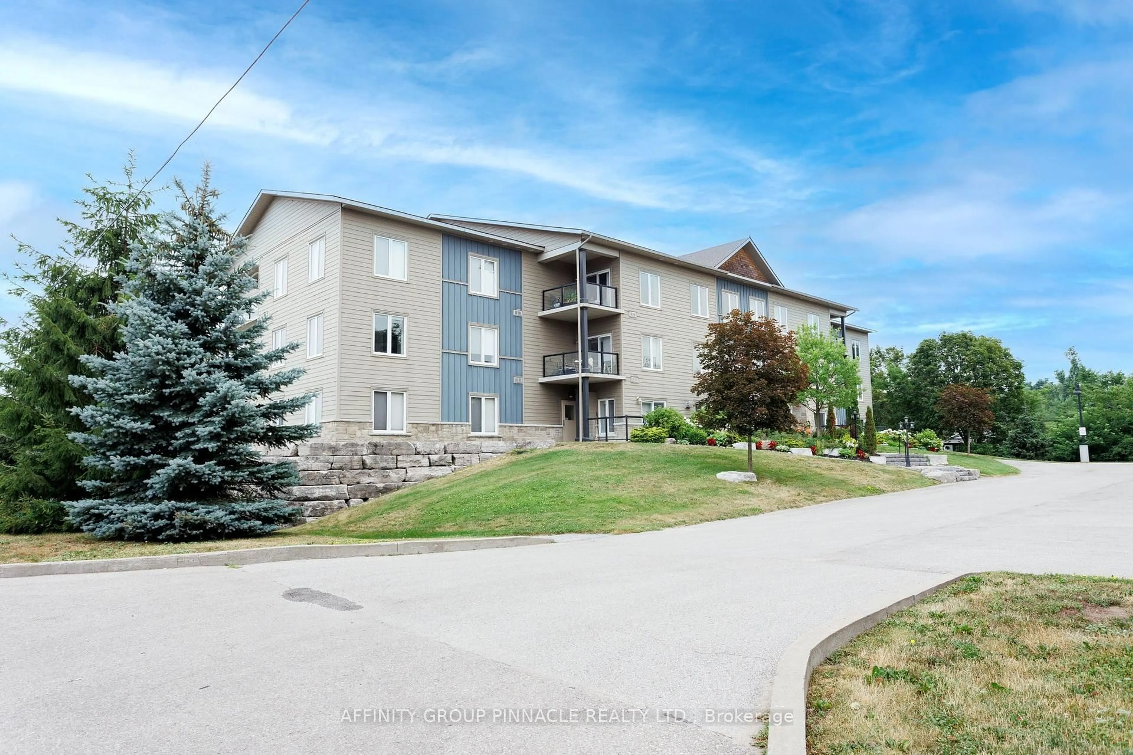 A pic from outside/outdoor area/front of a property/back of a property/a pic from drone, unknown for 94 Francis St #105, Kawartha Lakes Ontario K0M 1N0
