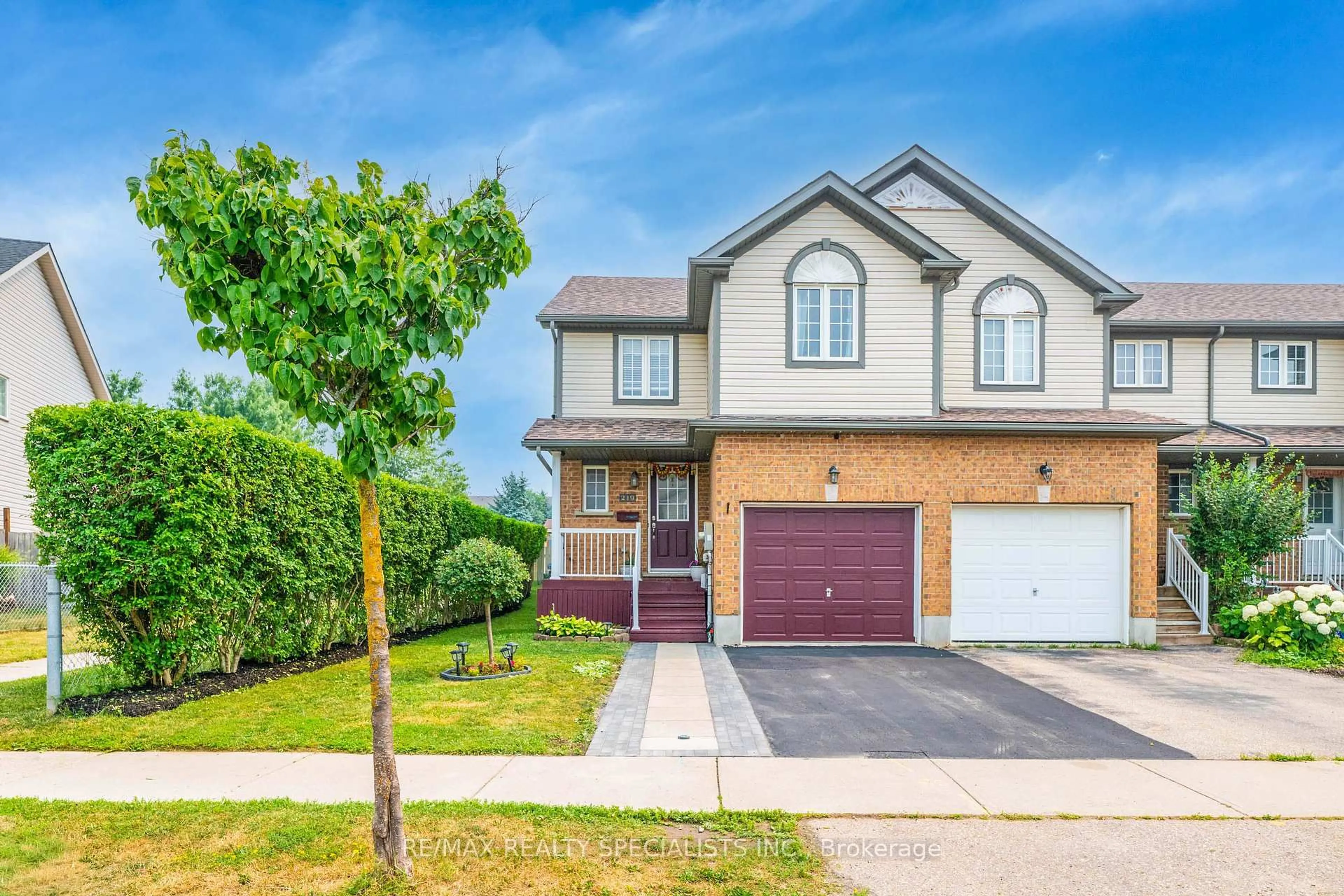 Home with brick exterior material, street for 219 Prosperity Dr, Kitchener Ontario N2E 4E5