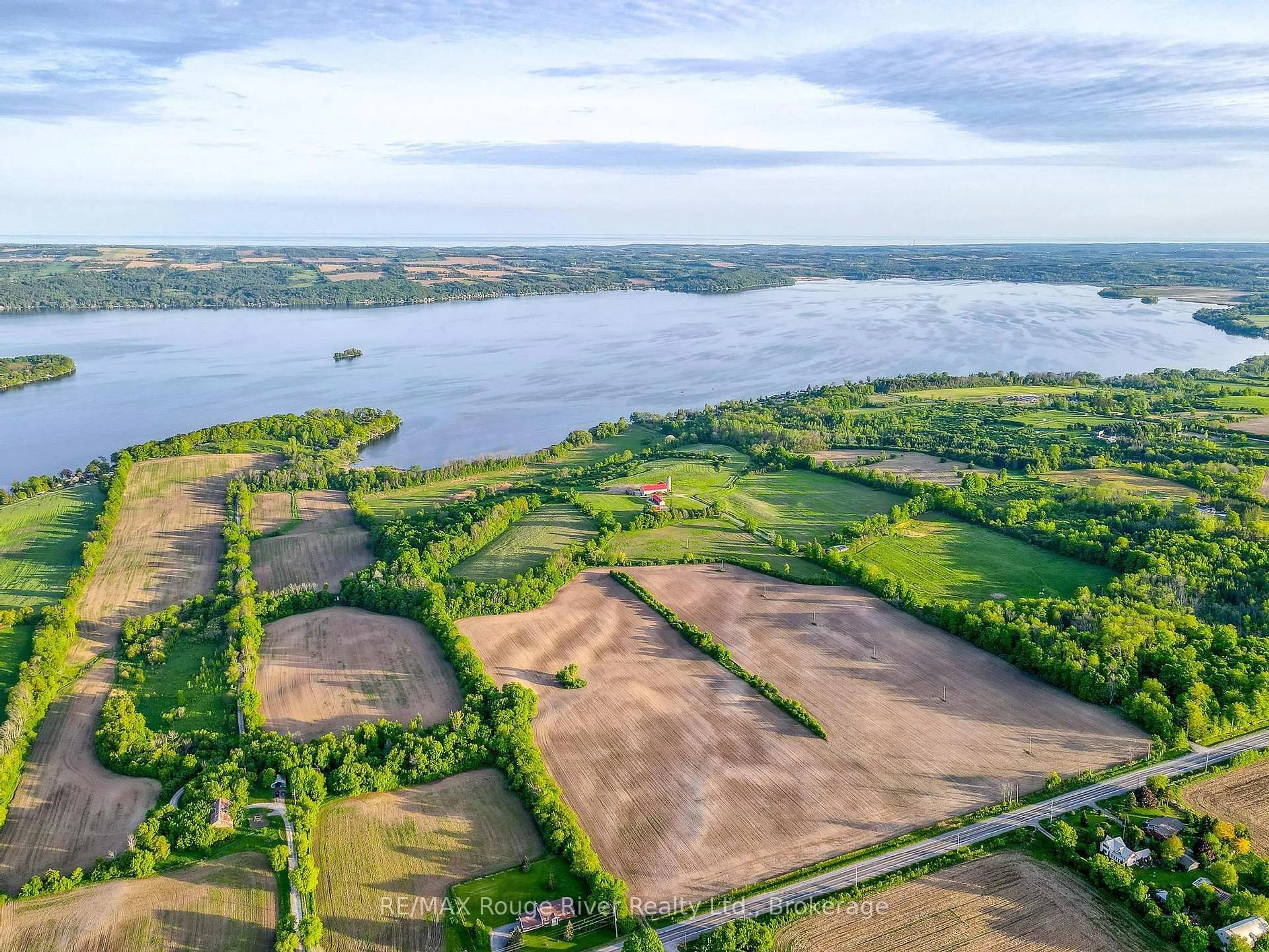 A pic from outside/outdoor area/front of a property/back of a property/a pic from drone, water/lake/river/ocean view for 733 COUNTY RD 2 RD Rd, Otonabee-South Monaghan Ontario K0L 1B0