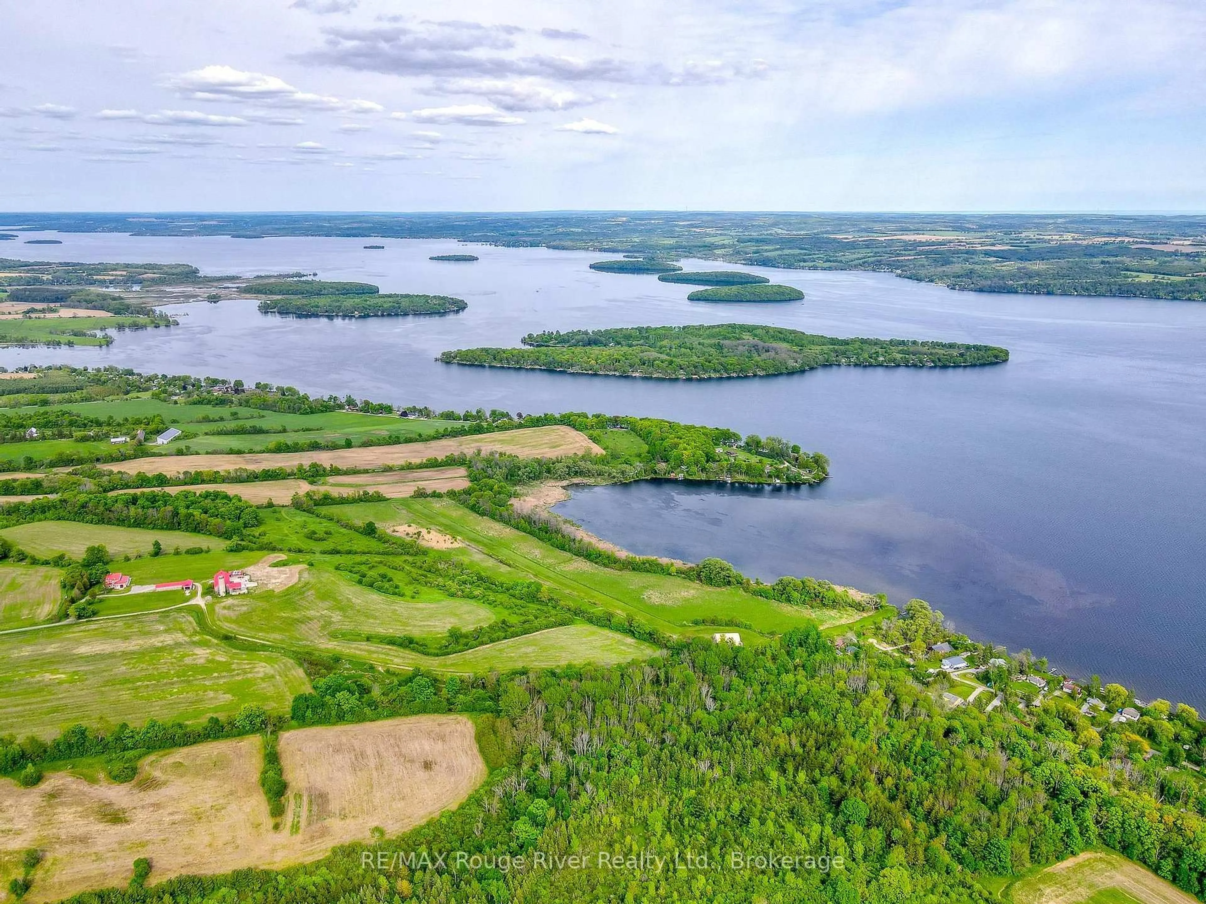 A pic from outside/outdoor area/front of a property/back of a property/a pic from drone, water/lake/river/ocean view for 733 COUNTY RD 2 RD Rd, Otonabee-South Monaghan Ontario K0L 1B0