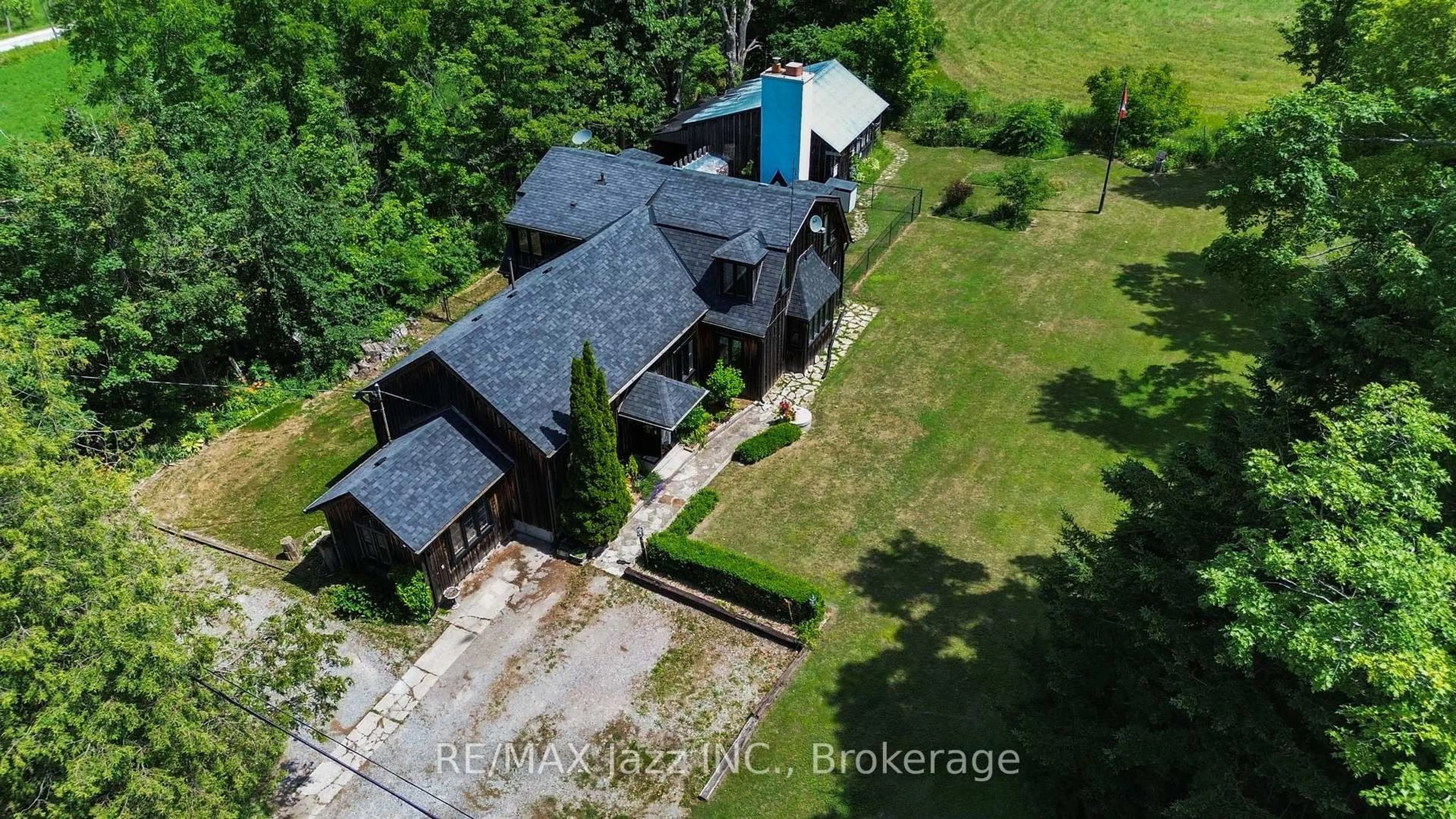 A pic from outside/outdoor area/front of a property/back of a property/a pic from drone, building for 372 County Rd 49, Trent Lakes Ontario L0M 1A0