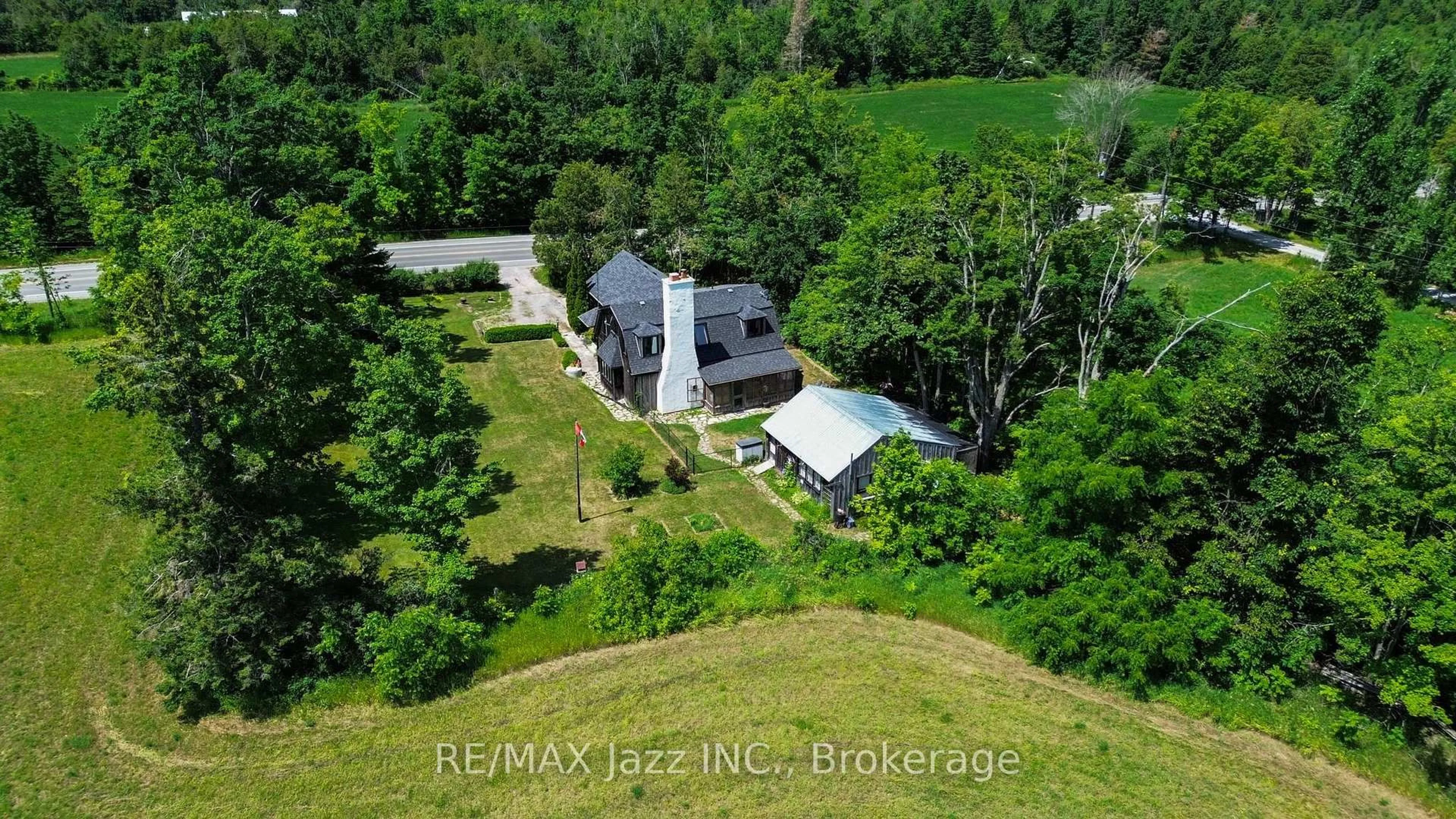 A pic from outside/outdoor area/front of a property/back of a property/a pic from drone, building for 372 County Rd 49, Trent Lakes Ontario L0M 1A0