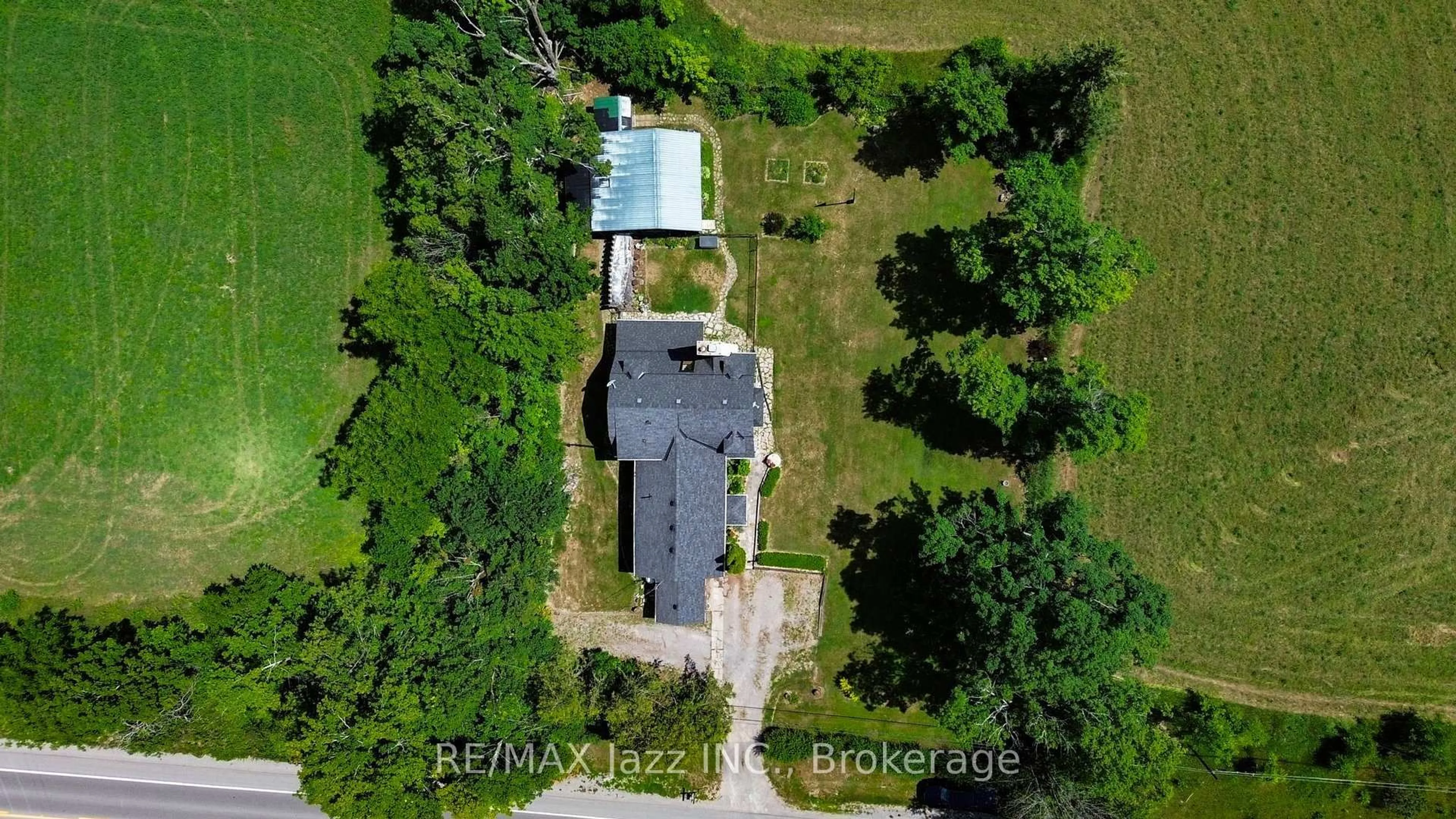 A pic from outside/outdoor area/front of a property/back of a property/a pic from drone, building for 372 County Rd 49, Trent Lakes Ontario L0M 1A0