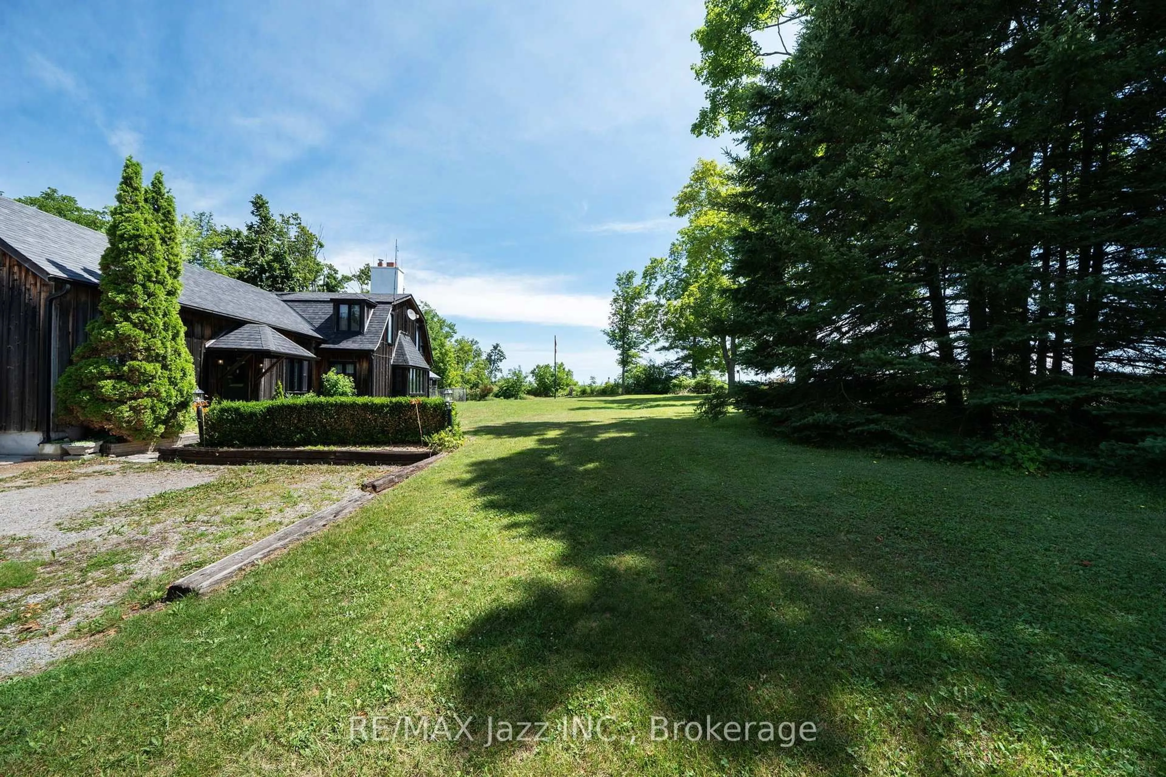 A pic from outside/outdoor area/front of a property/back of a property/a pic from drone, water/lake/river/ocean view for 372 County Rd 49, Trent Lakes Ontario L0M 1A0