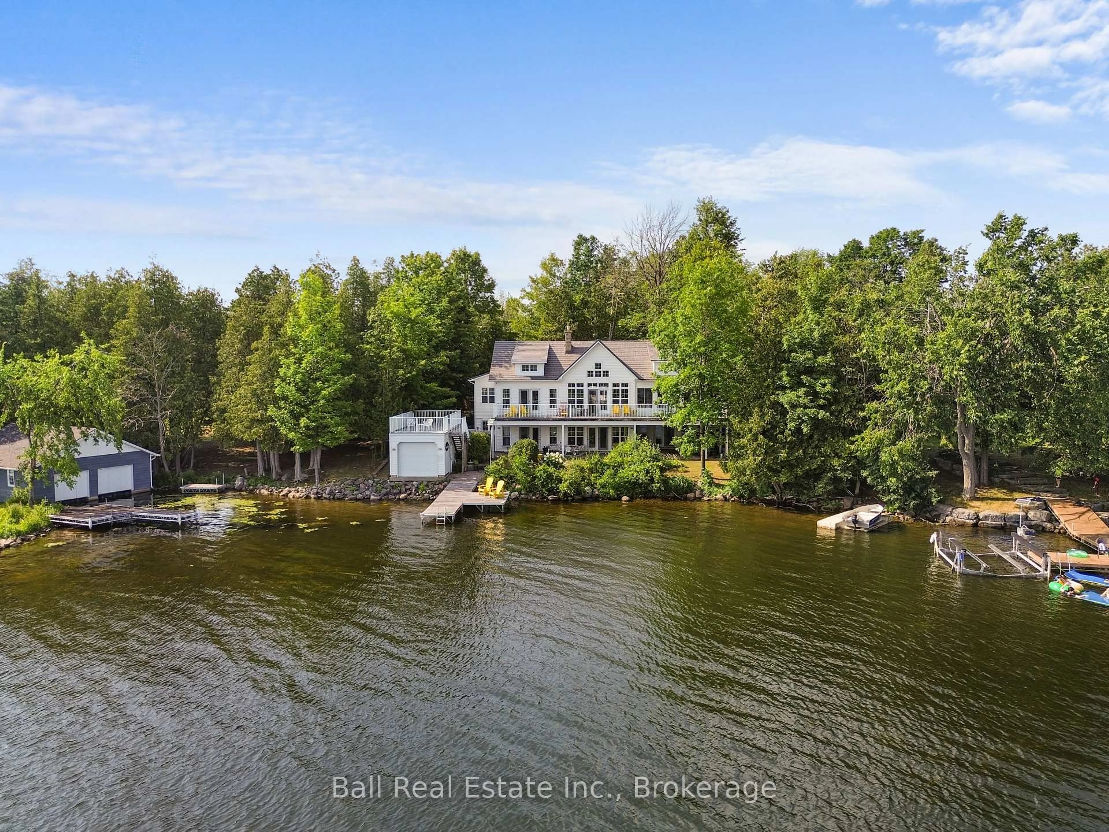 A pic from outside/outdoor area/front of a property/back of a property/a pic from drone, water/lake/river/ocean view for 96 Fire Route 98, Trent Lakes Ontario K0M 1A0