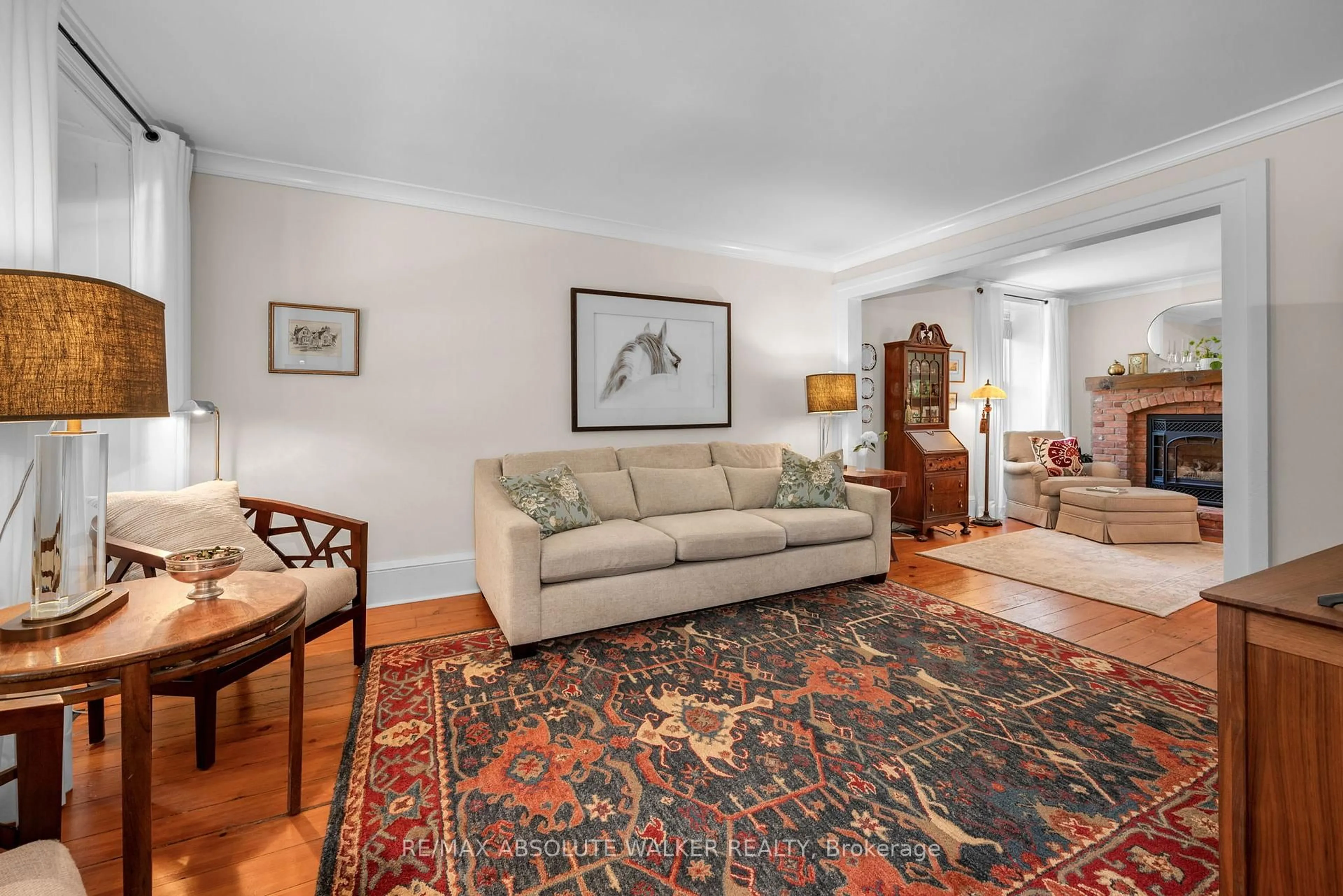 Living room with furniture, carpet floor for 652 Henry St, Prescott Ontario K0E 1T0