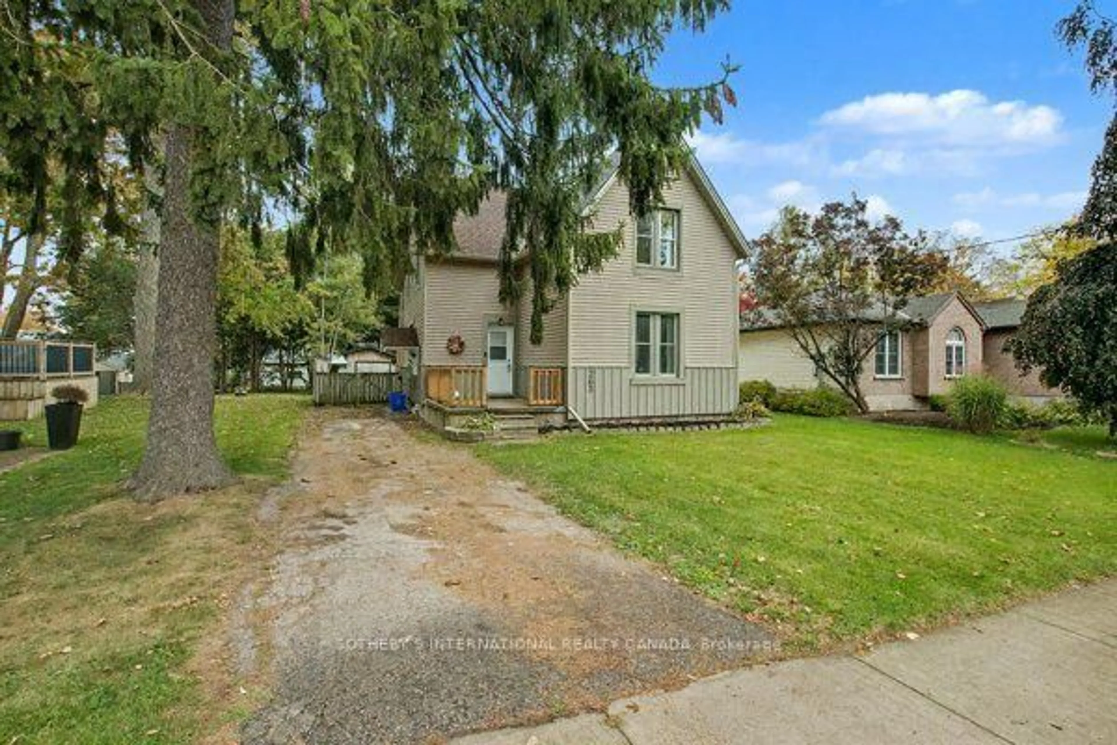 A pic from outside/outdoor area/front of a property/back of a property/a pic from drone, street for 263 Cumberland St, Minto Ontario N0G 2P0