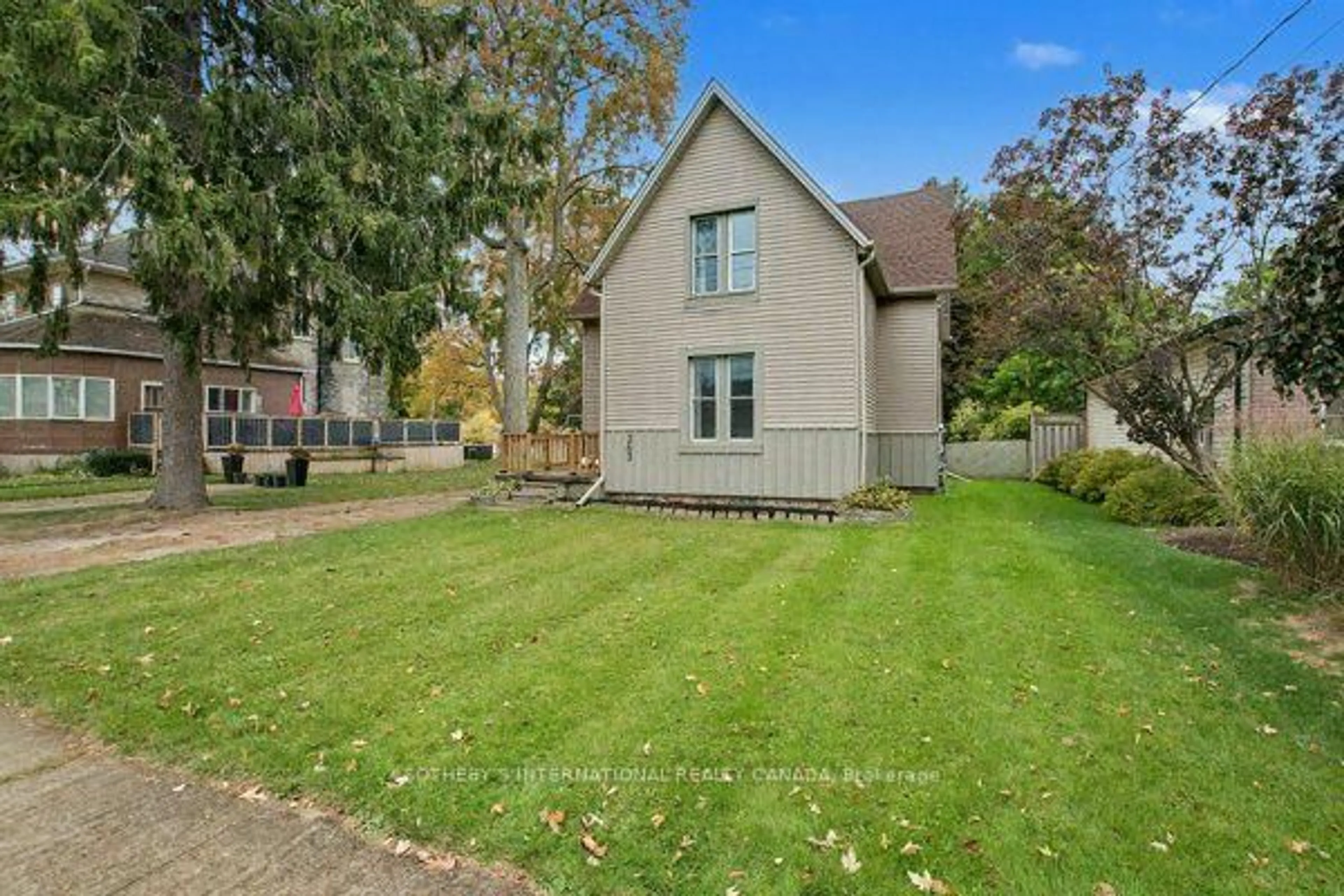 A pic from outside/outdoor area/front of a property/back of a property/a pic from drone, street for 263 Cumberland St, Minto Ontario N0G 2P0