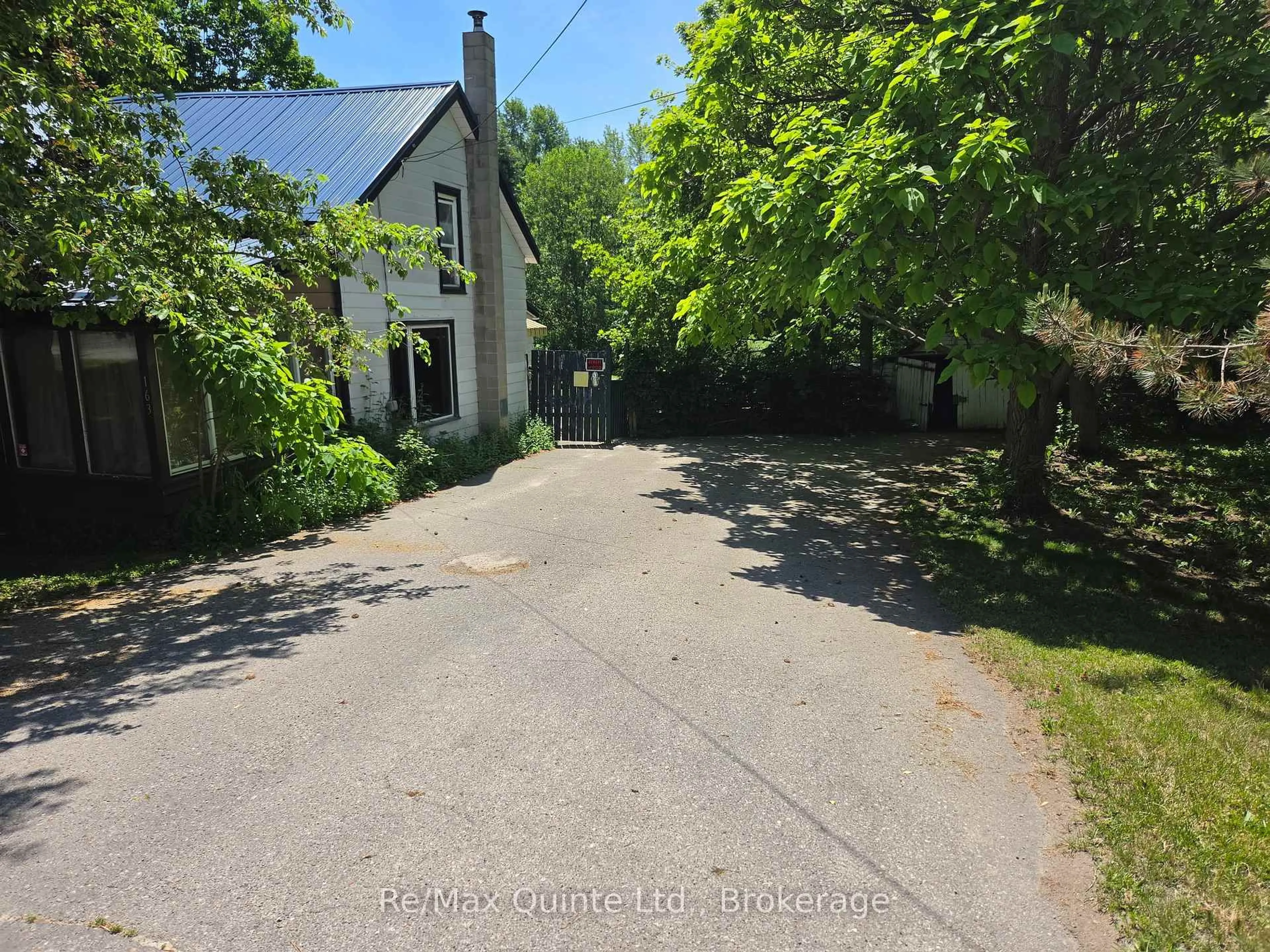 A pic from outside/outdoor area/front of a property/back of a property/a pic from drone, street for 163 Main St, Prince Edward County Ontario K0K 1G0