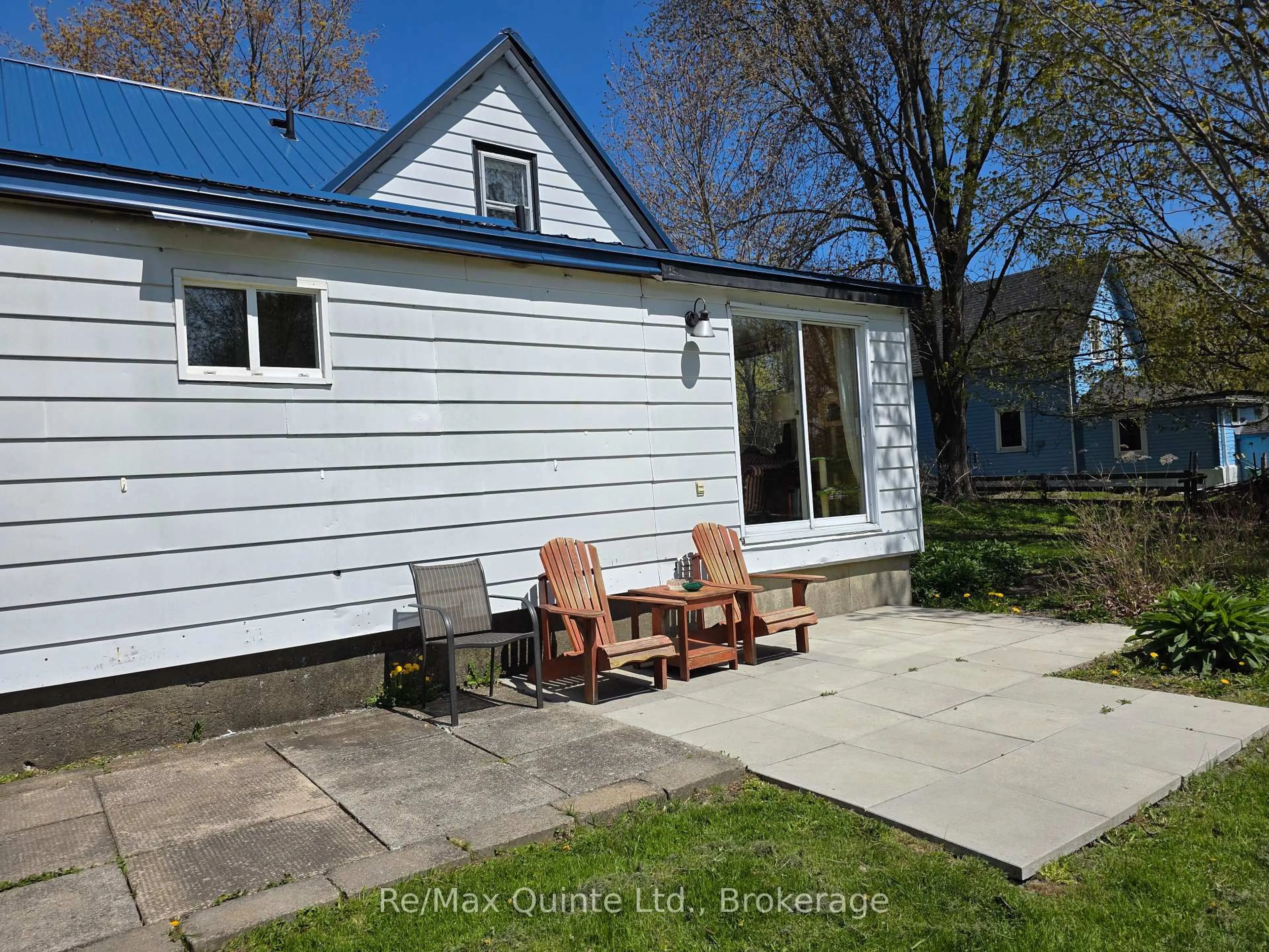 A pic from outside/outdoor area/front of a property/back of a property/a pic from drone, street for 163 Main St, Prince Edward County Ontario K0K 1G0