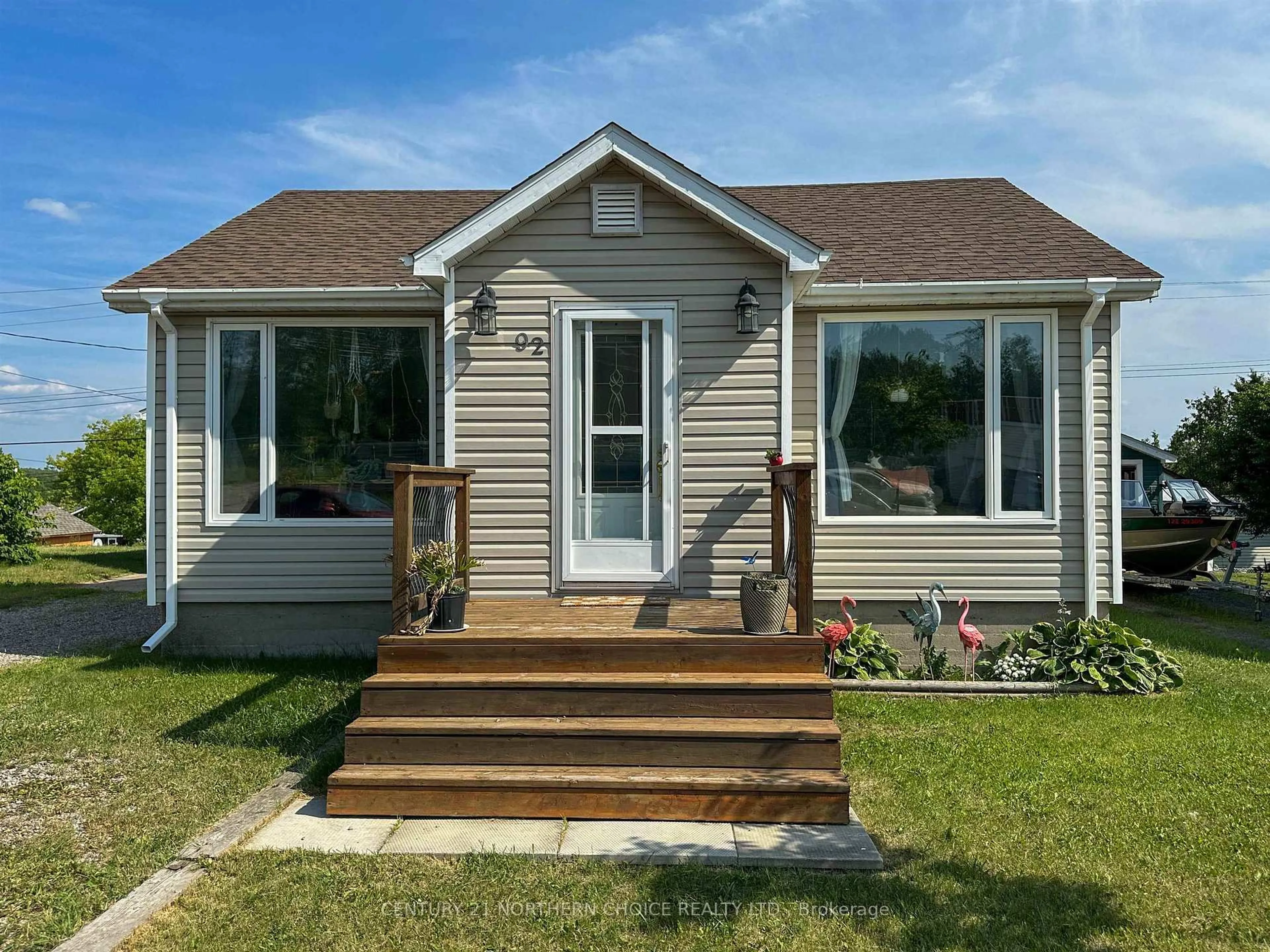 Home with vinyl exterior material, street for 92 Lassie Rd, Red Lake Ontario P0V 1C0