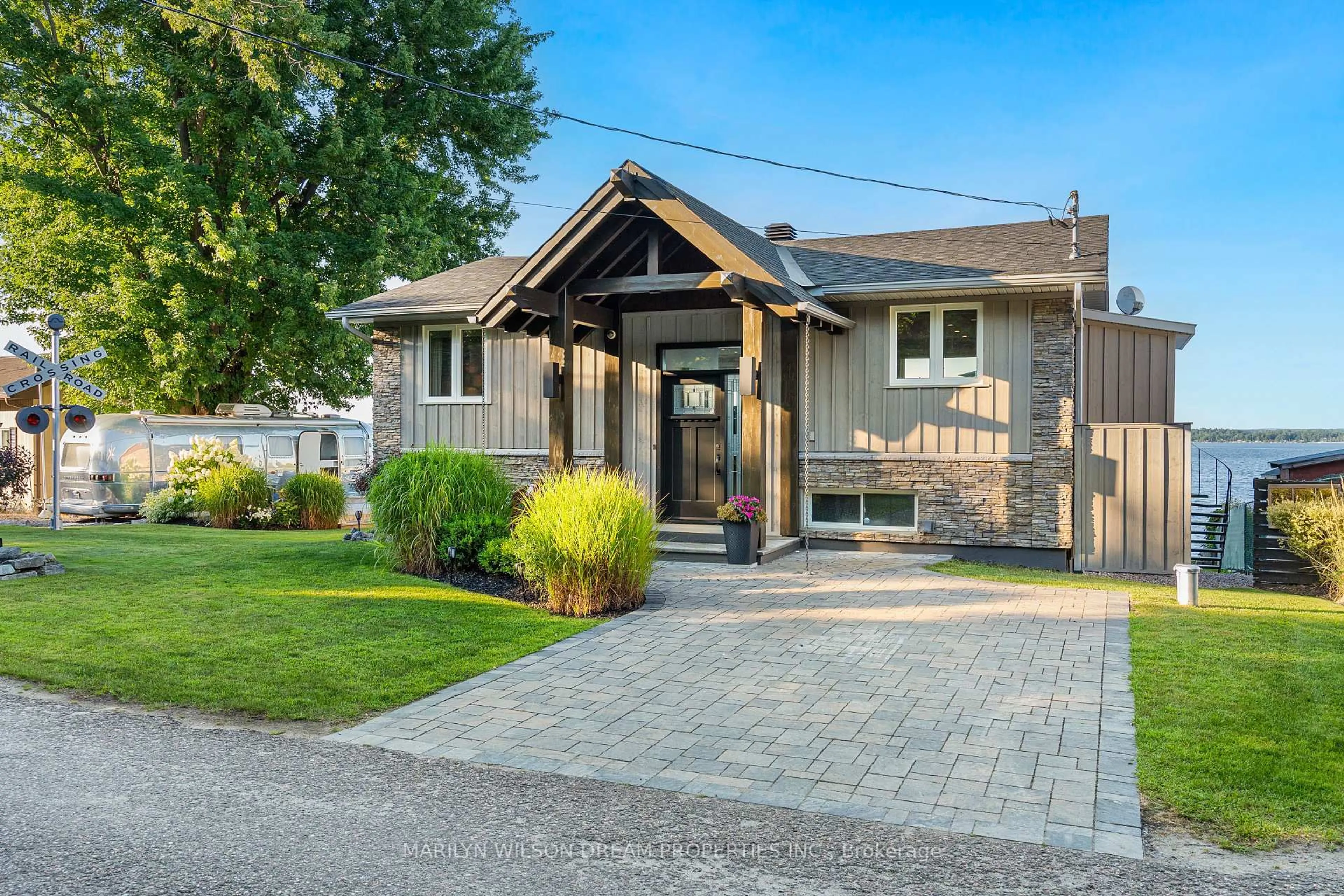 Home with brick exterior material, street for 614 Lake St, Renfrew Ontario K7V 3Z8