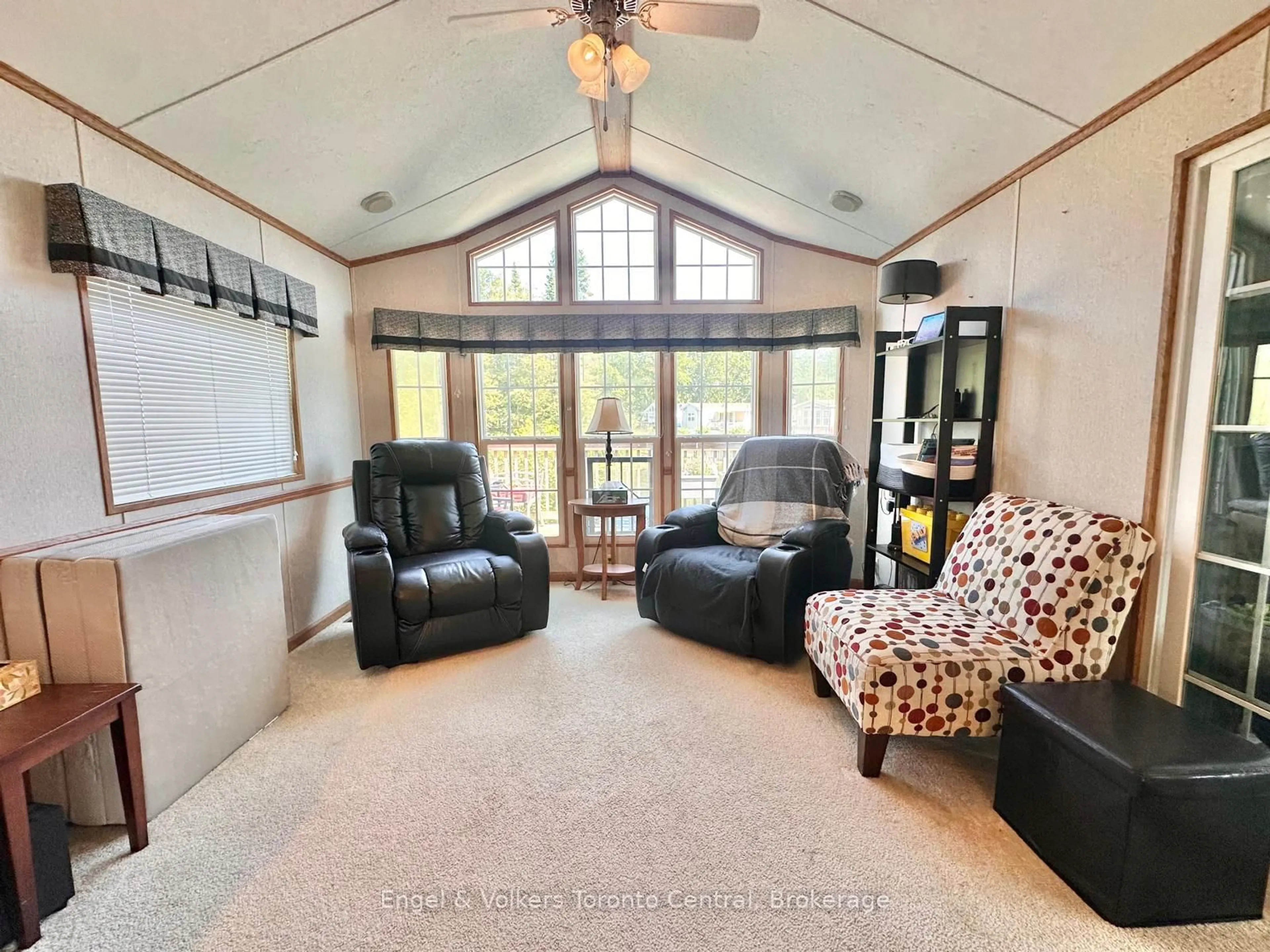 Living room with furniture, unknown for 7489 SIDEROAD 5 #T113, Wellington North Ontario N0G 2L0