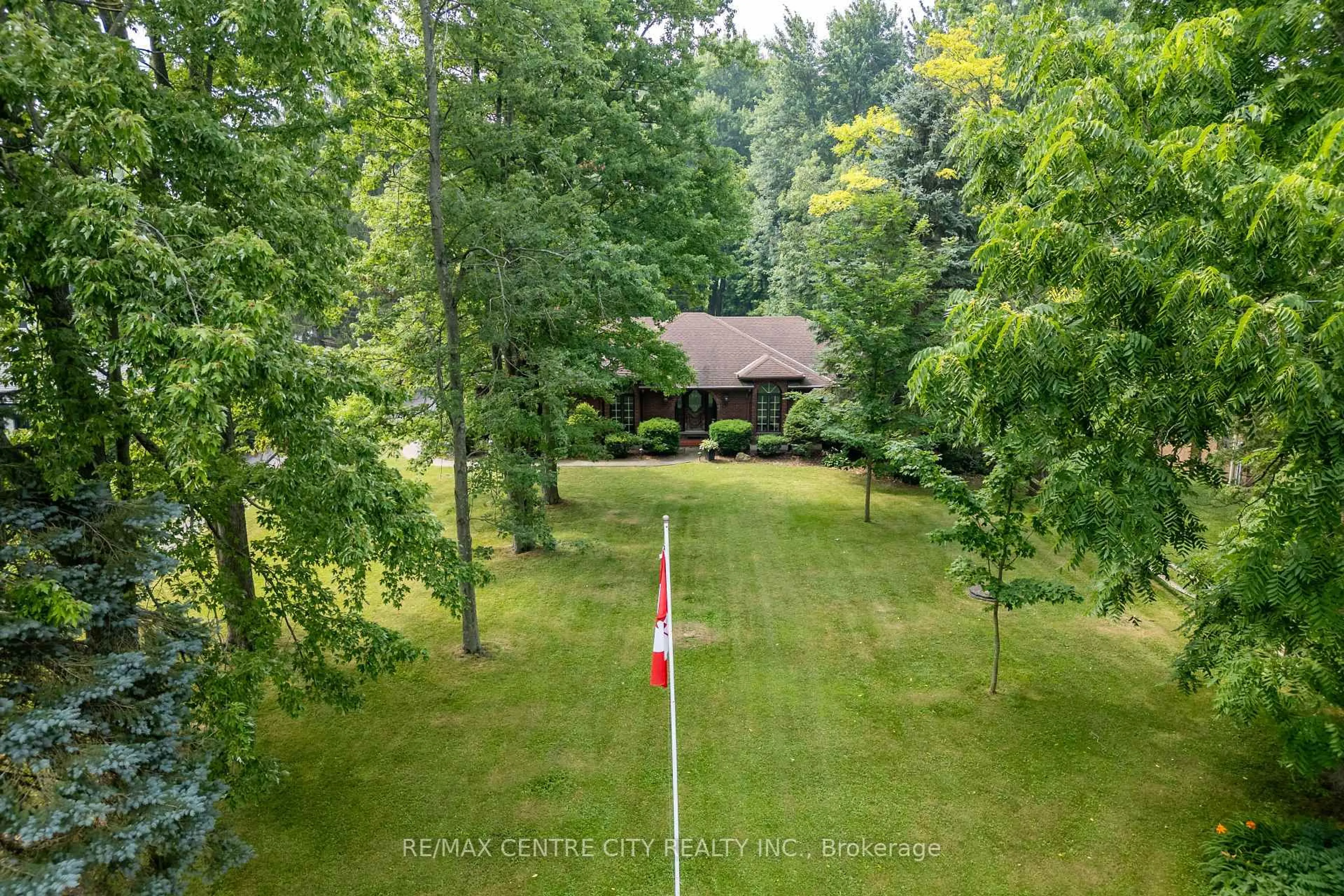 A pic from outside/outdoor area/front of a property/back of a property/a pic from drone, forest/trees view for 42067 Ferguson Line, Central Elgin Ontario N5P 3T1