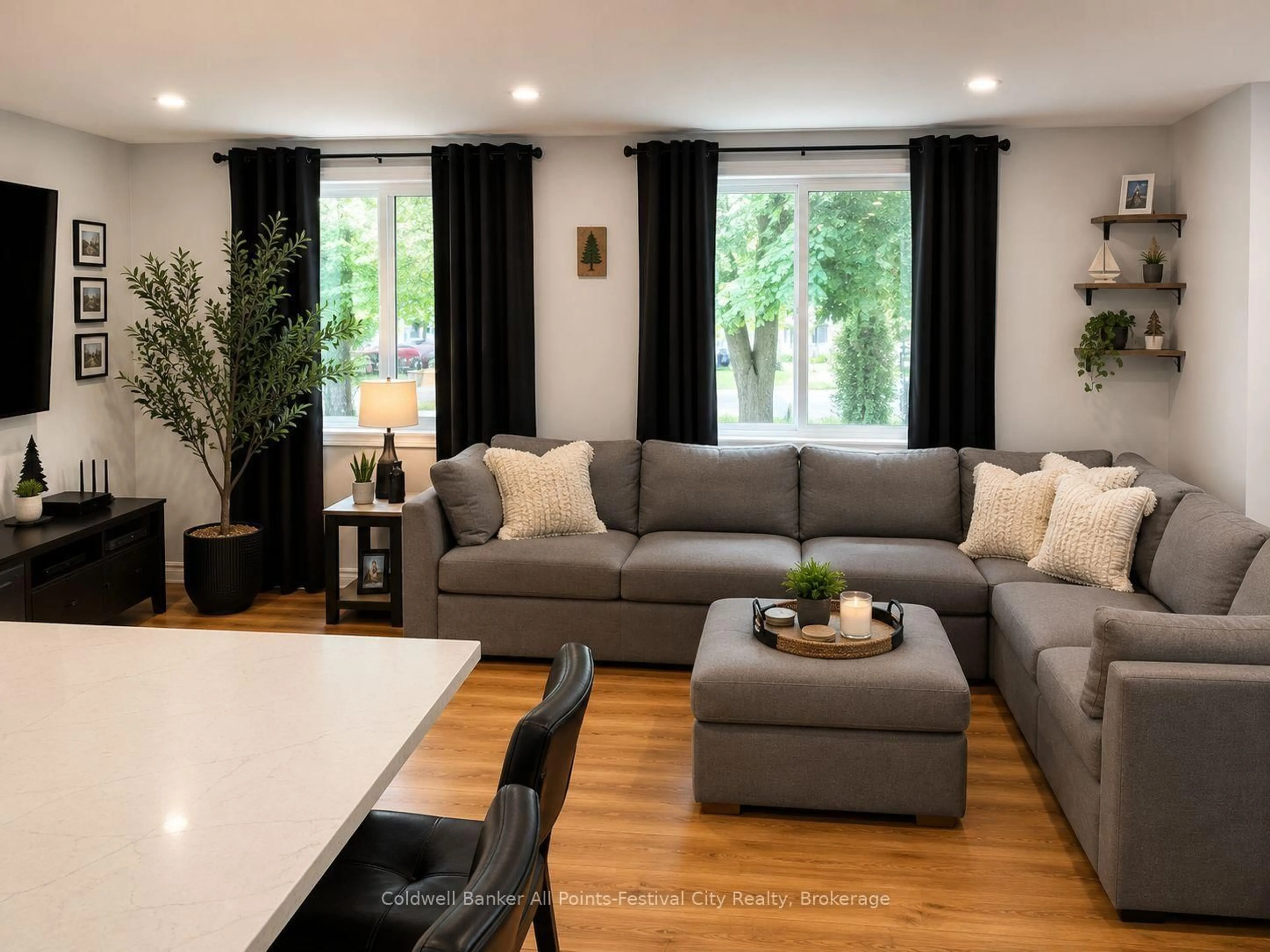 Living room with furniture, wood/laminate floor for 219 St. David St, West Perth Ontario N0K 1N0