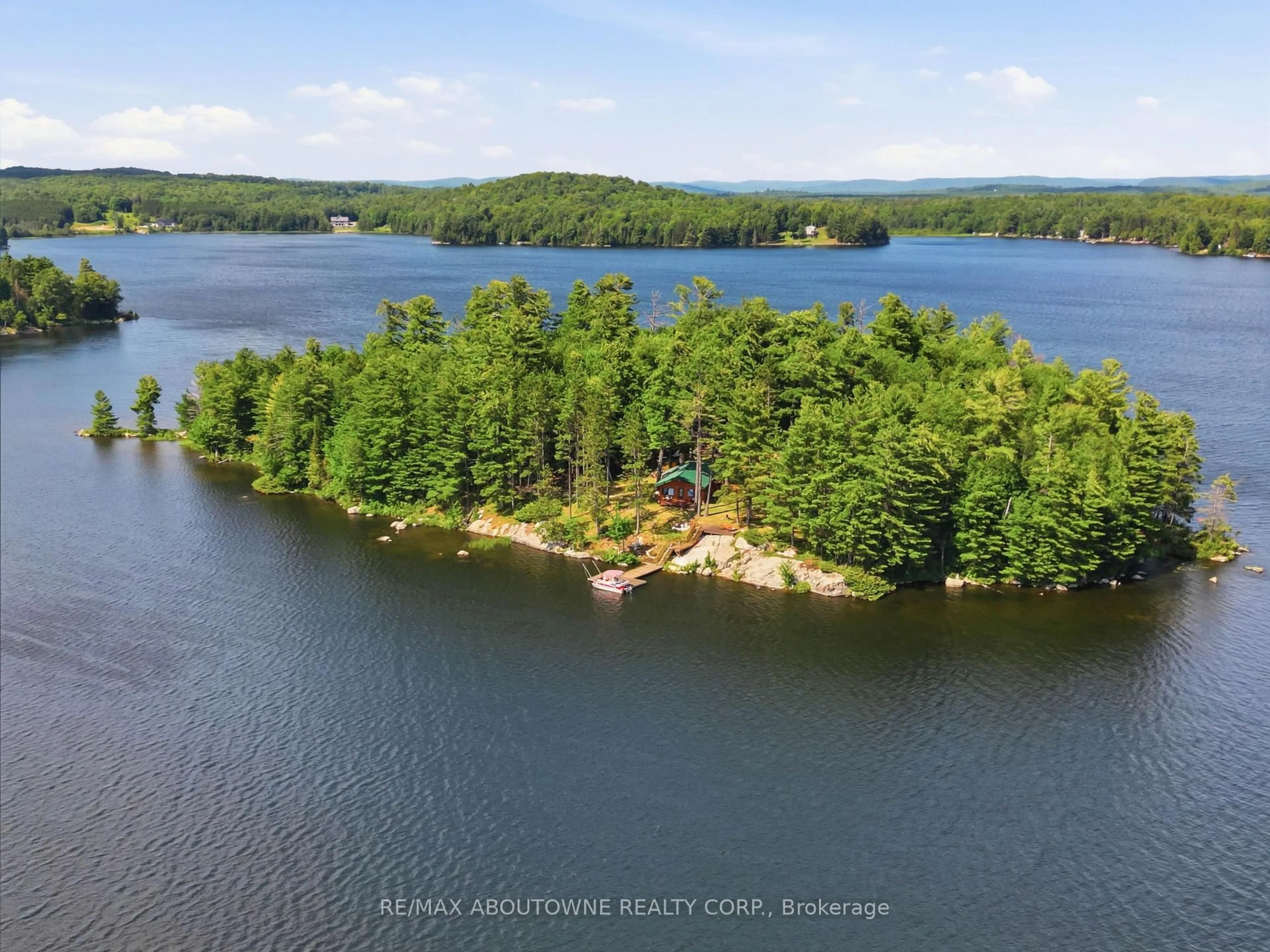A pic from outside/outdoor area/front of a property/back of a property/a pic from drone, water/lake/river/ocean view for 370 Fraser Lake, Bancroft Ontario K0L 1C0