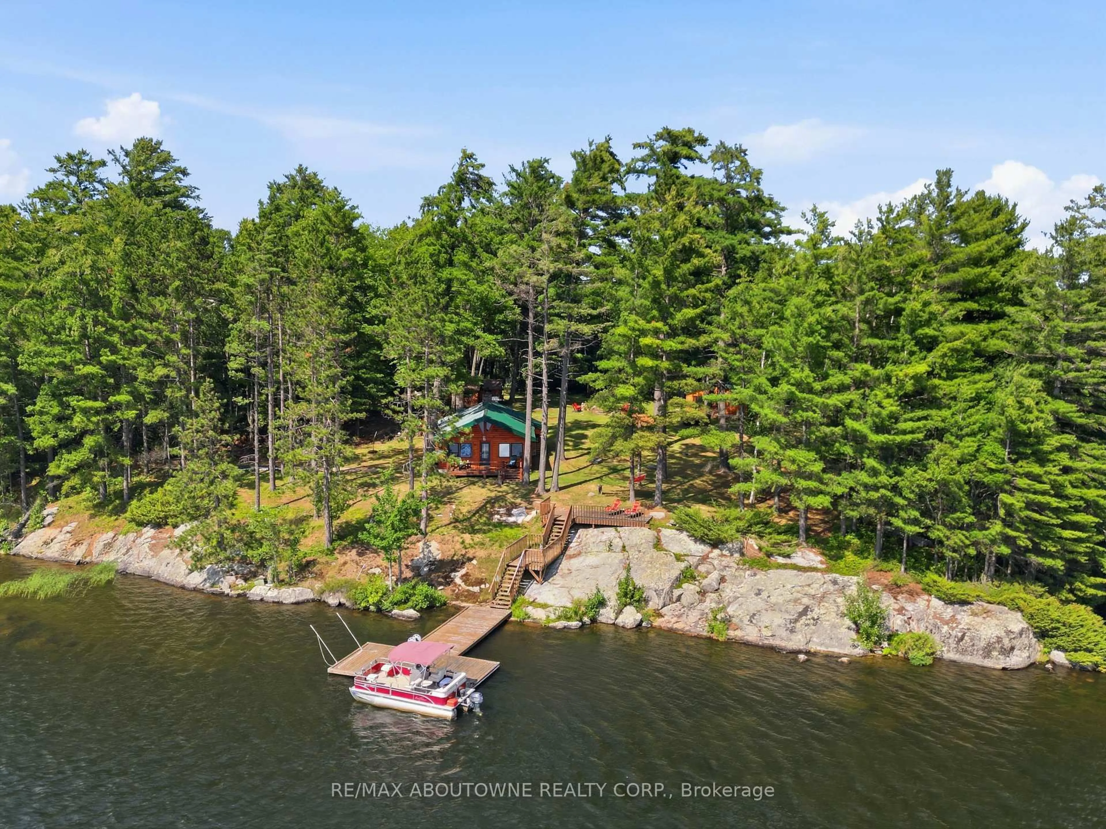 A pic from outside/outdoor area/front of a property/back of a property/a pic from drone, water/lake/river/ocean view for 370 Fraser Lake, Bancroft Ontario K0L 1C0