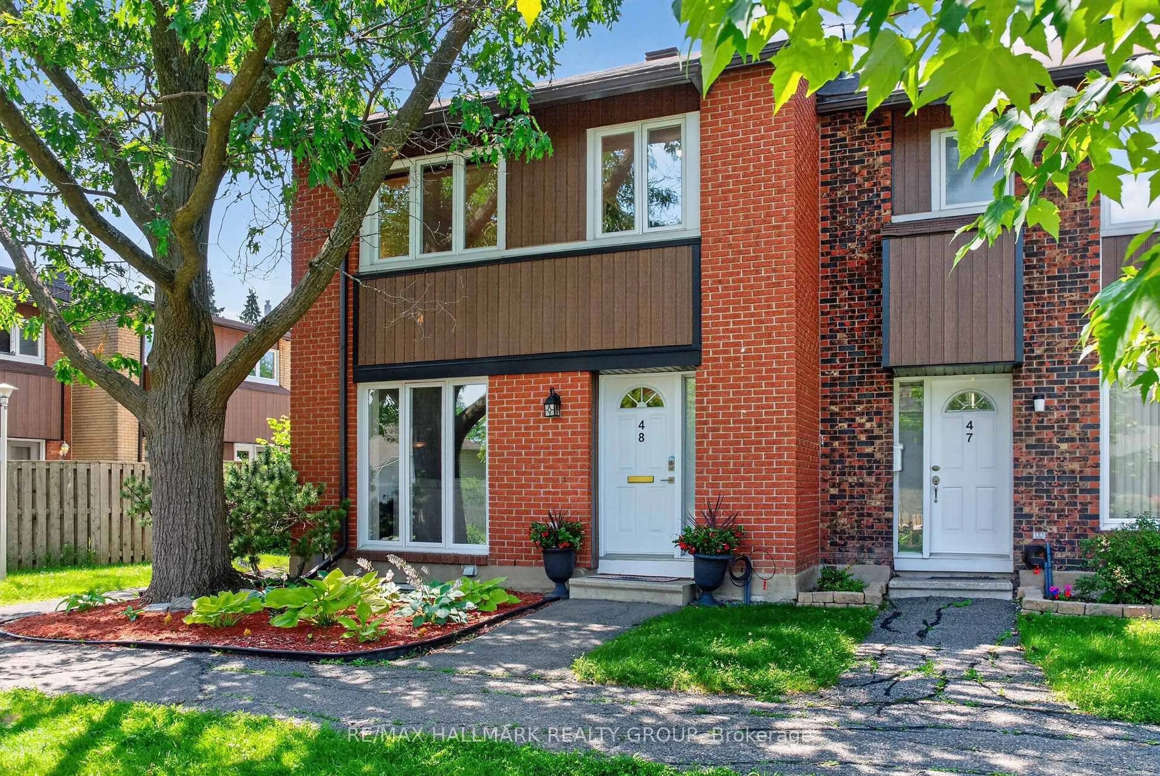 Home with brick exterior material, street for 1900 Marquis Ave #48, Ottawa Ontario K1J 8J2