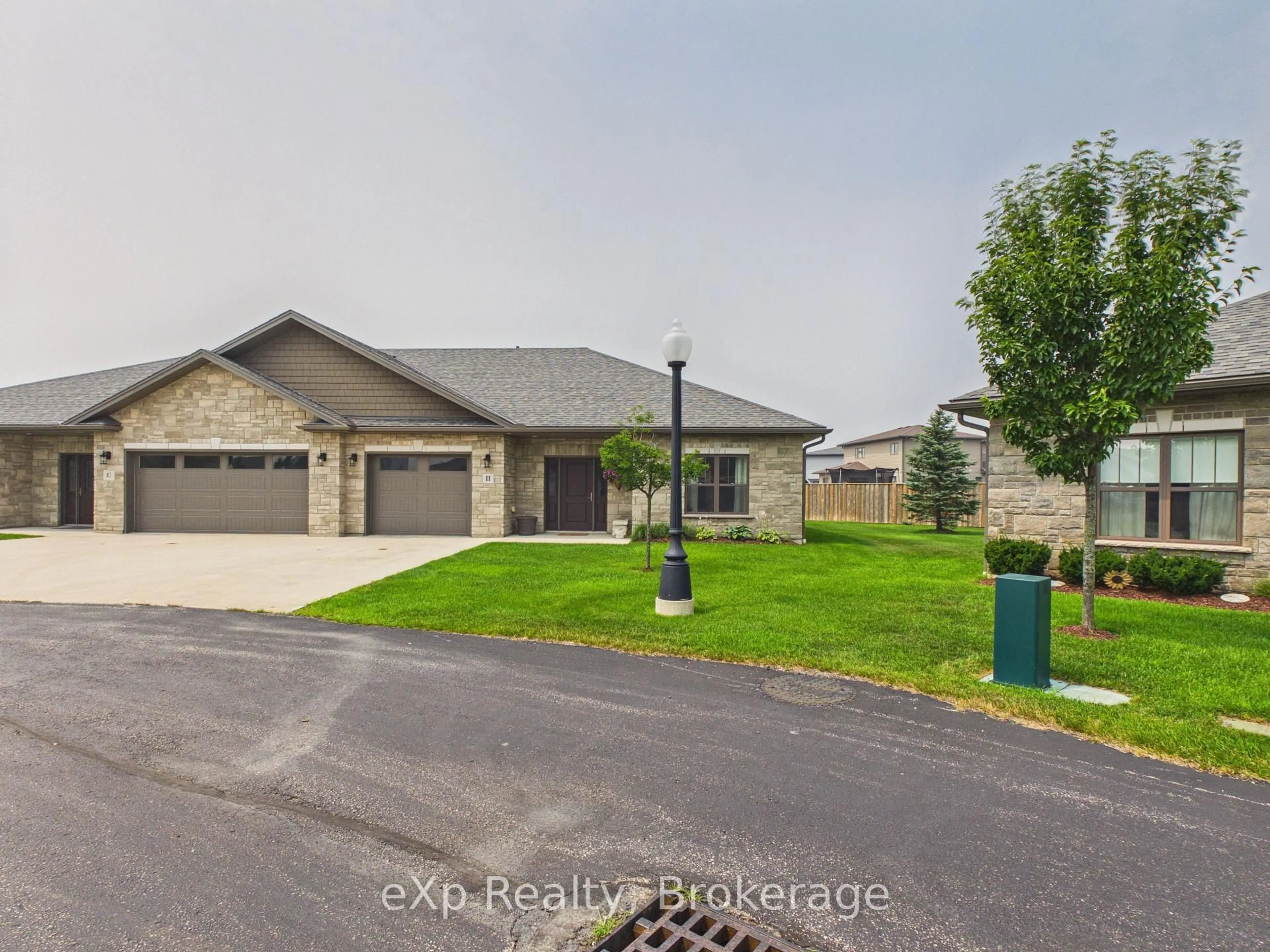 A pic from outside/outdoor area/front of a property/back of a property/a pic from drone, street for 1050 Waterloo St #11, Saugeen Shores Ontario N0H 2C3