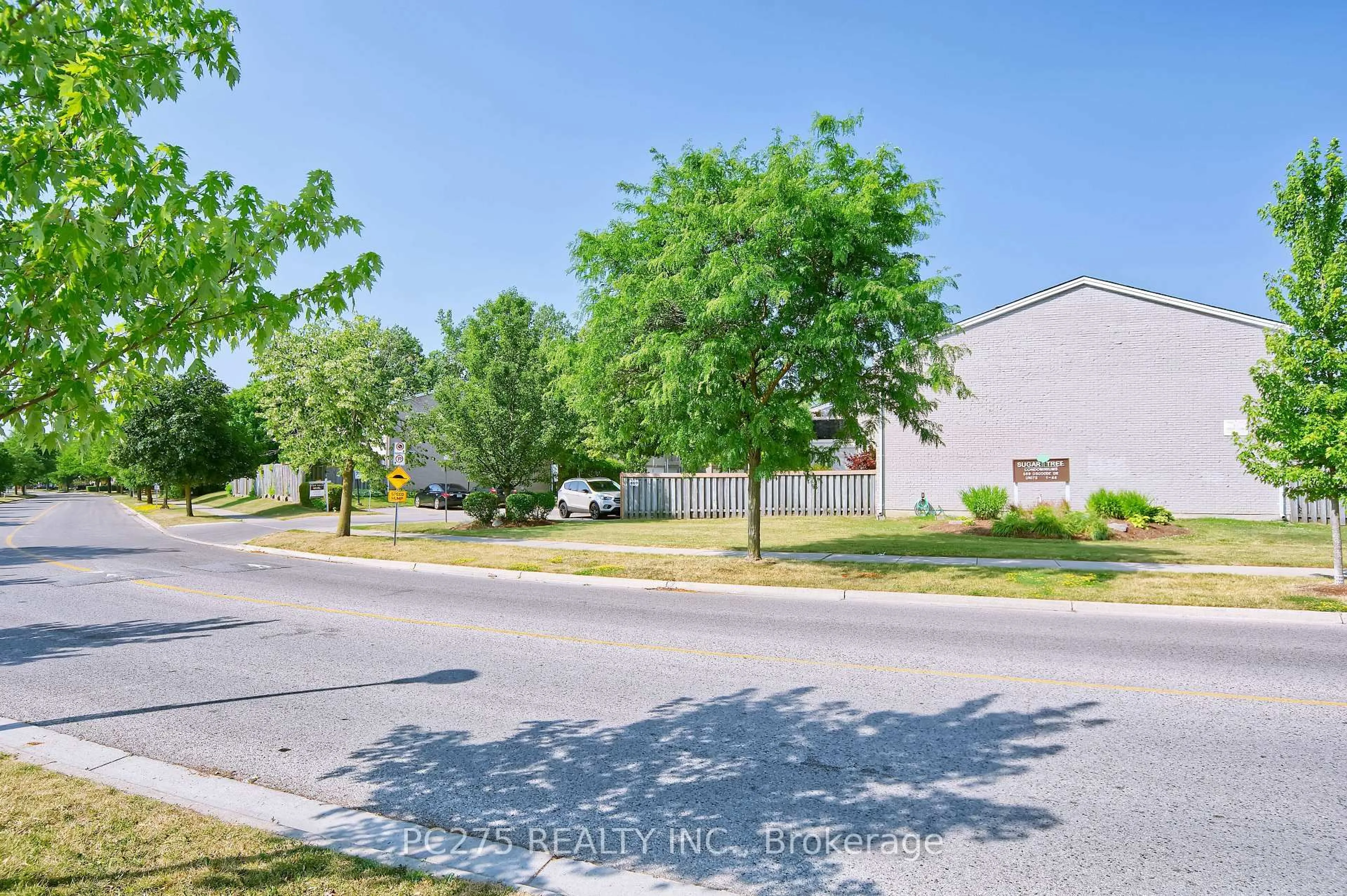 A pic from outside/outdoor area/front of a property/back of a property/a pic from drone, street for 669 Osgoode Dr #15, London South Ontario N6E 2C7