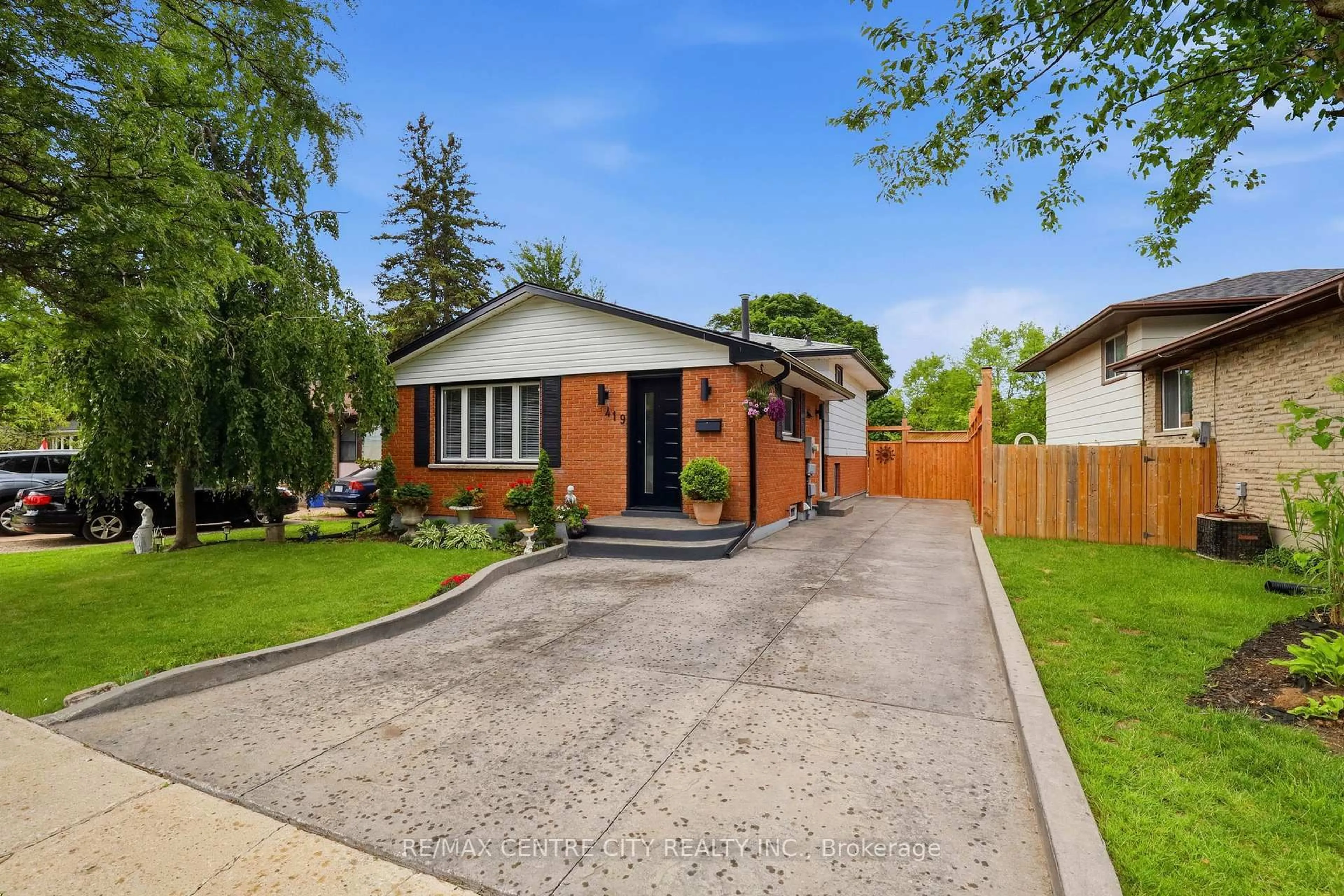 Home with brick exterior material, street for 419 Ferndale Ave, London South Ontario N6C 2Y9