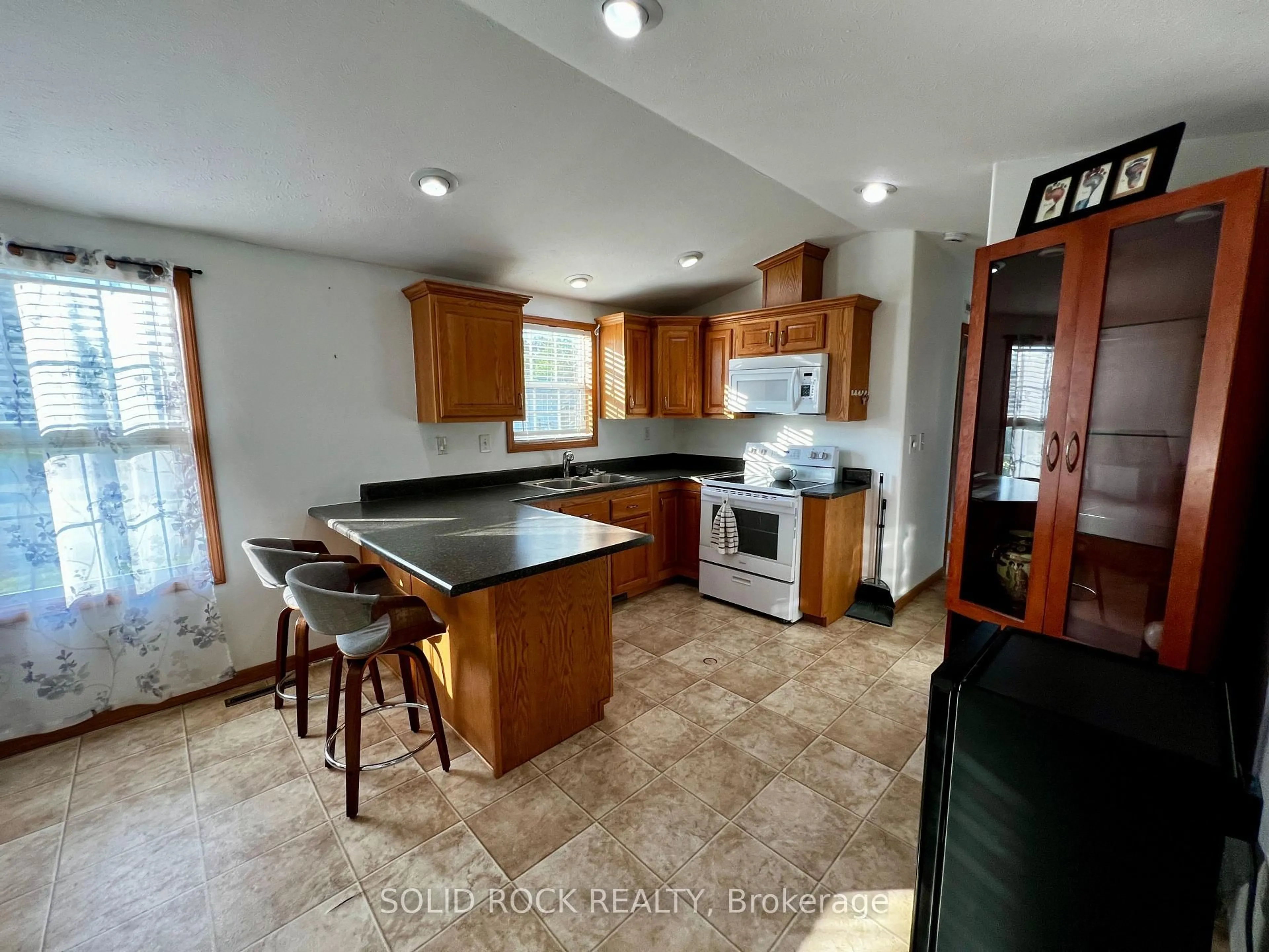Open concept kitchen, ceramic/tile floor for 3535 St Joseph Blvd #90, Orleans Ontario K4A 0Z6
