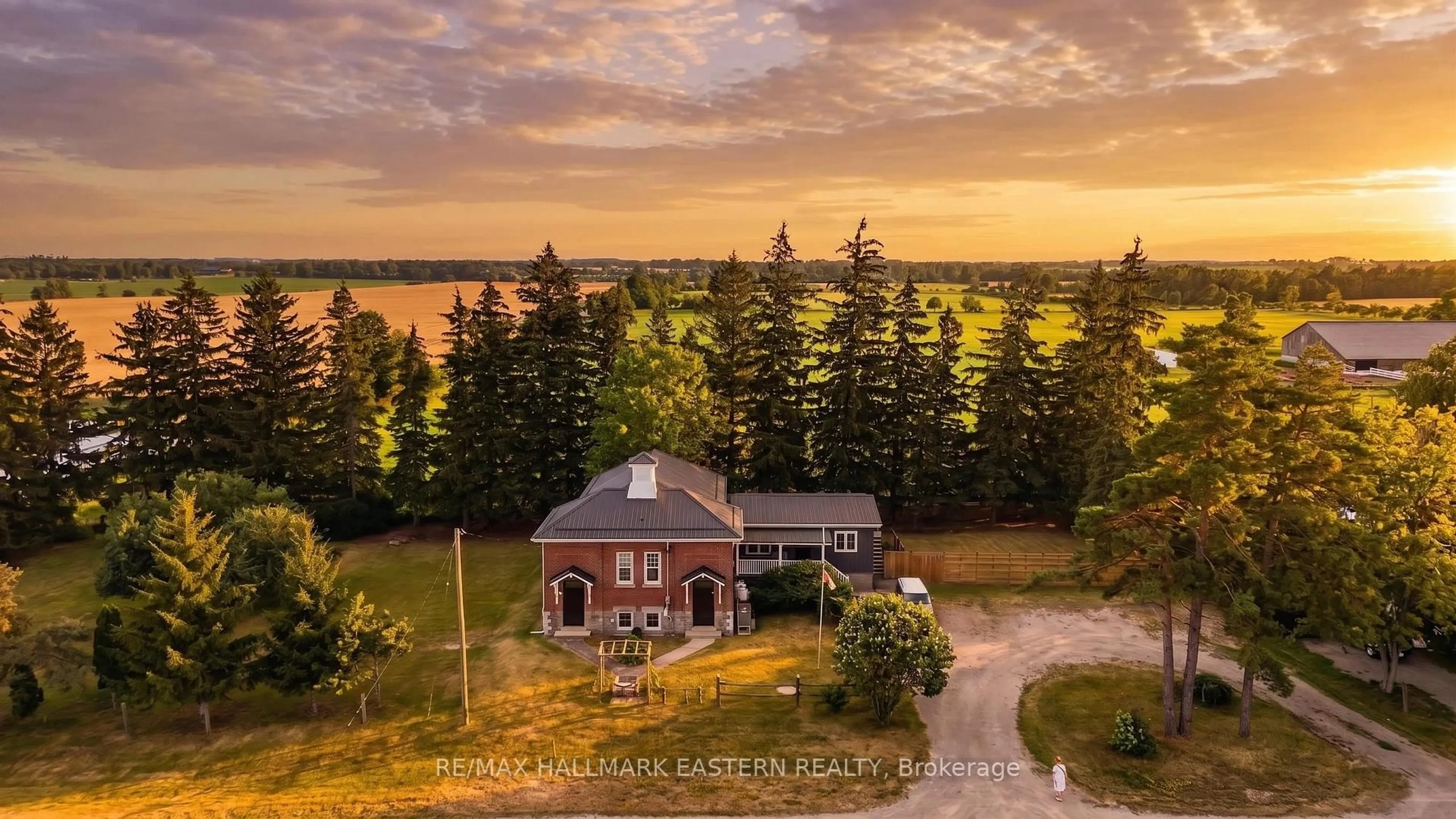 A pic from outside/outdoor area/front of a property/back of a property/a pic from drone, water/lake/river/ocean view for 1231 Highway 7, Kawartha Lakes Ontario K0M 2M0