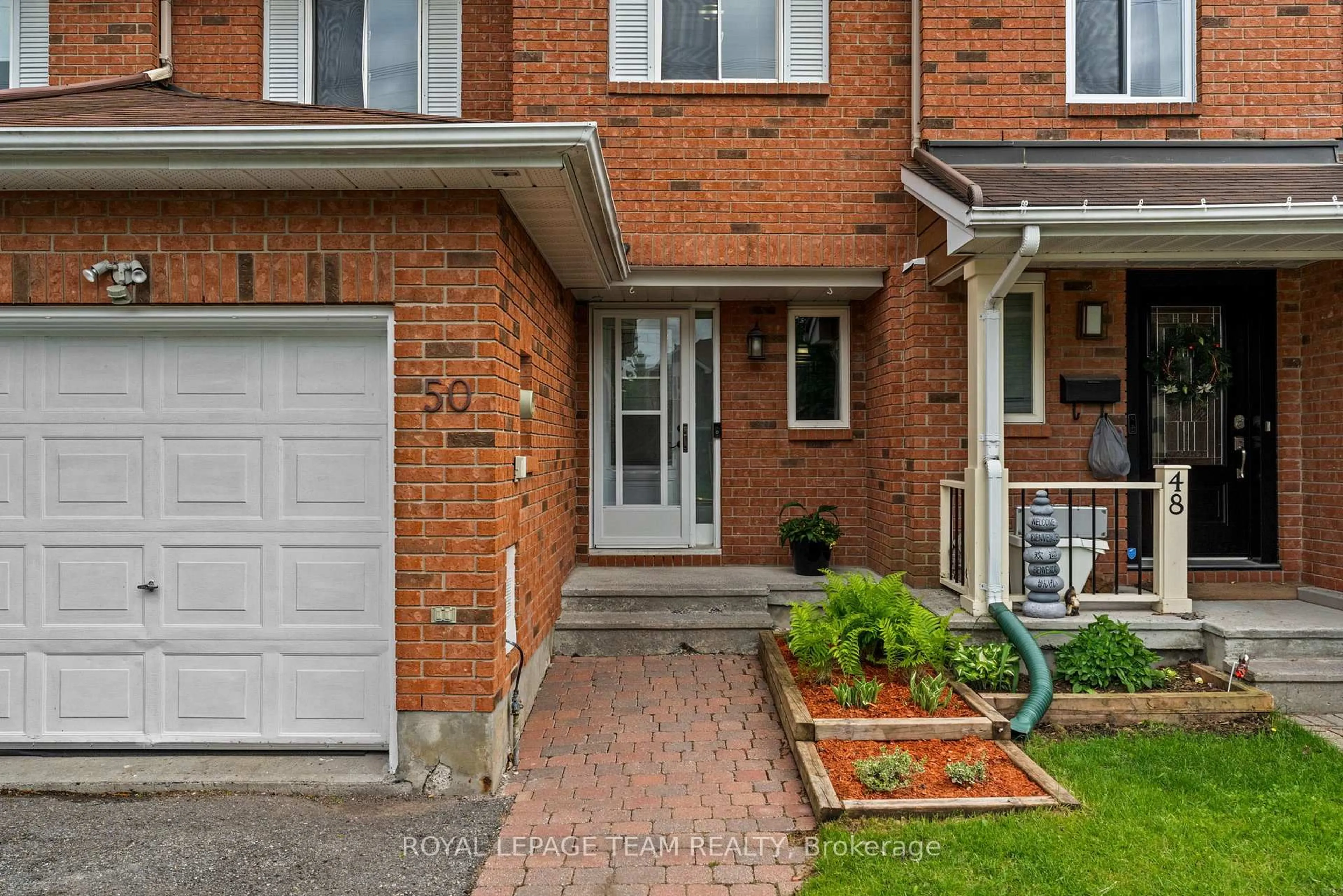 Home with brick exterior material, street for 50 Springcreek Cres, Ottawa Ontario K2M 2M2