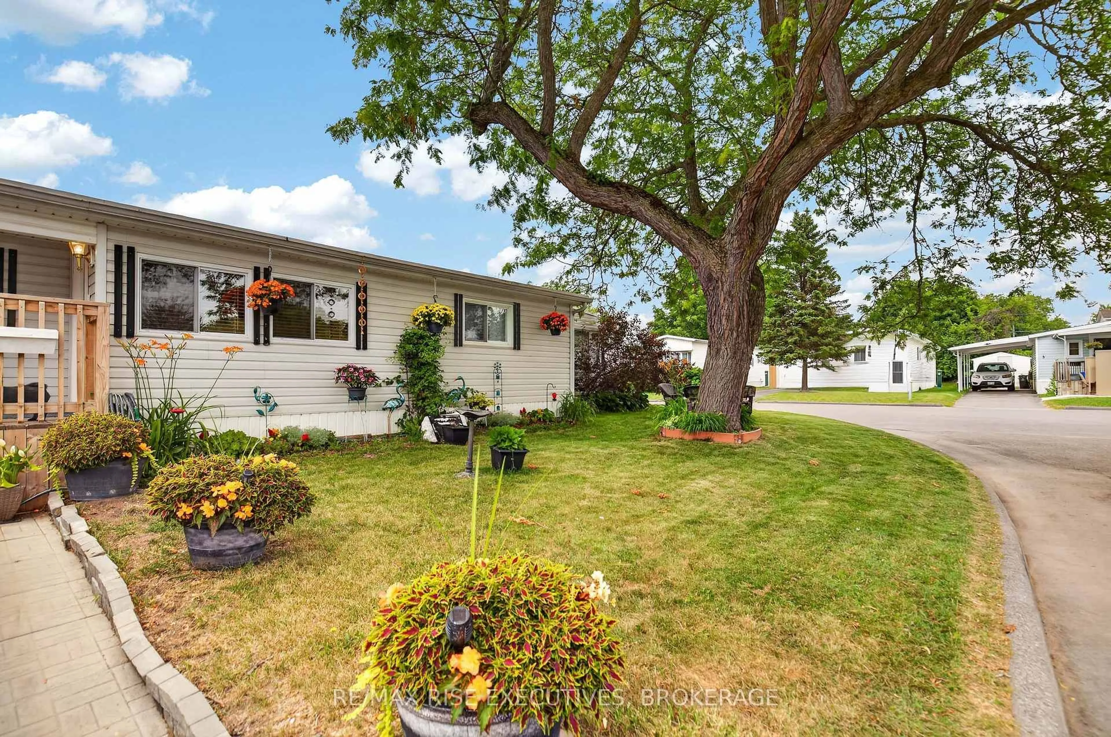 Home with vinyl exterior material, street for 18 Wentworth Dr, Kingston Ontario K7K 5C9